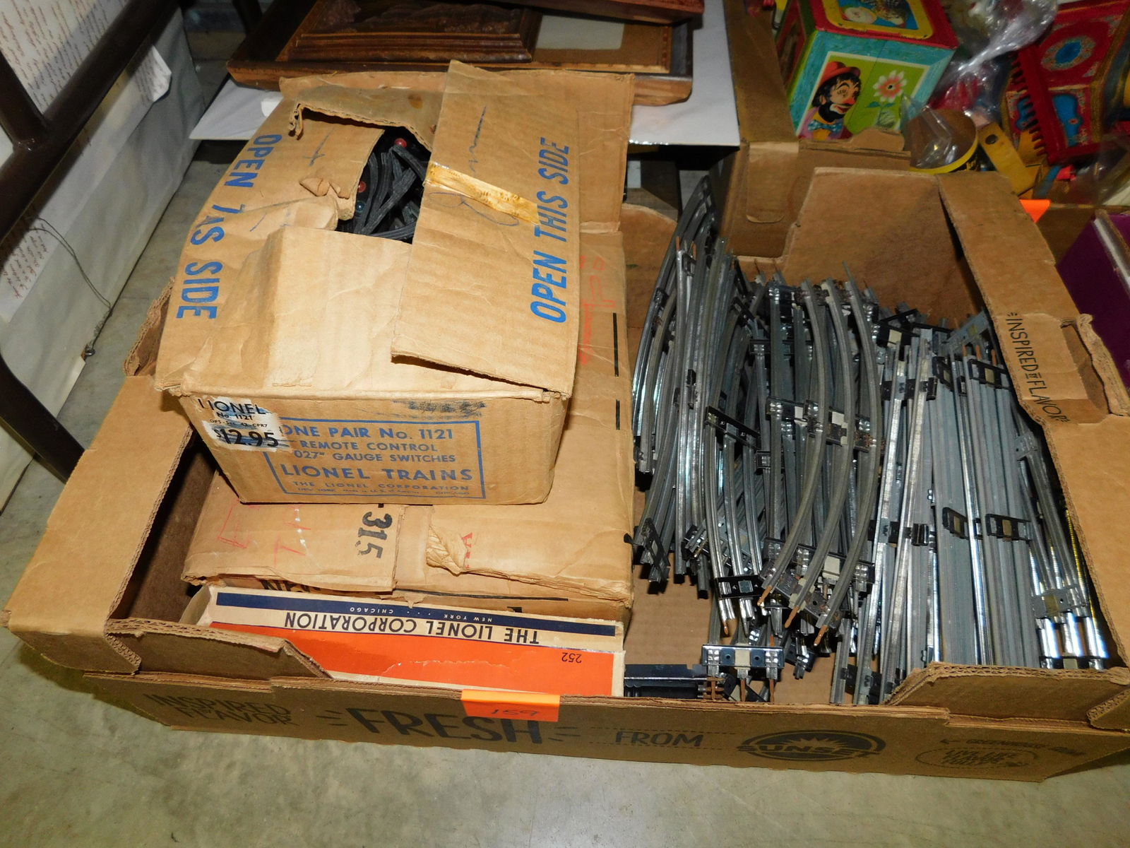 Box Lot of Lionel Track and Switches: Box Lot of Lionel Train Track and Switches. You are bidding at a live sale. Please read the terms and conditions. This sale will be broadcast live on sale day with full descriptions of each lot being