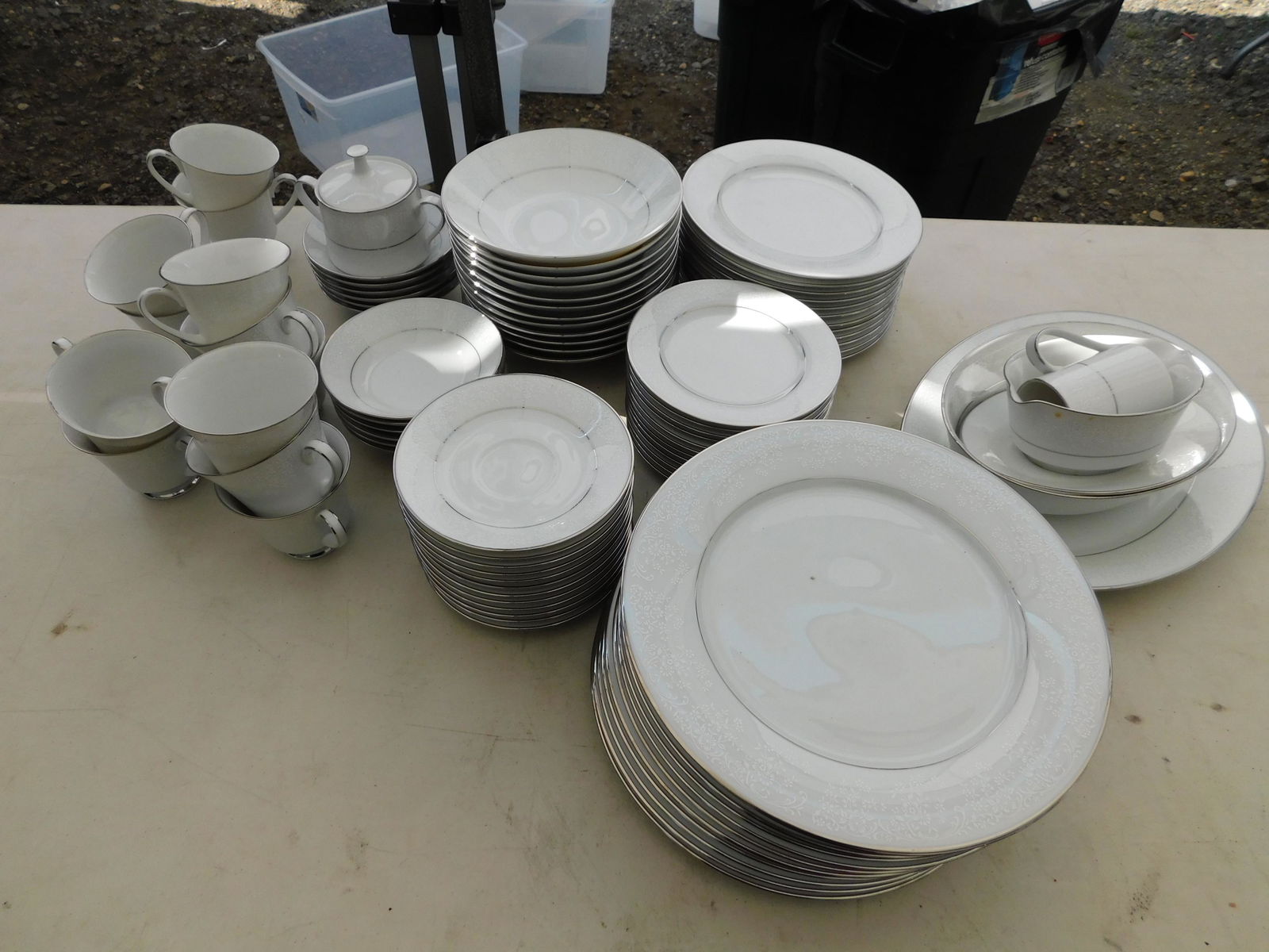Noritake Pahoe Dinnerware Set: Service for 12 Noritake Pahoe Dinnerware Set. You are bidding at a live sale. Please read the terms and conditions. This sale will be broadcast live on sale day with full descriptions of each lot bein