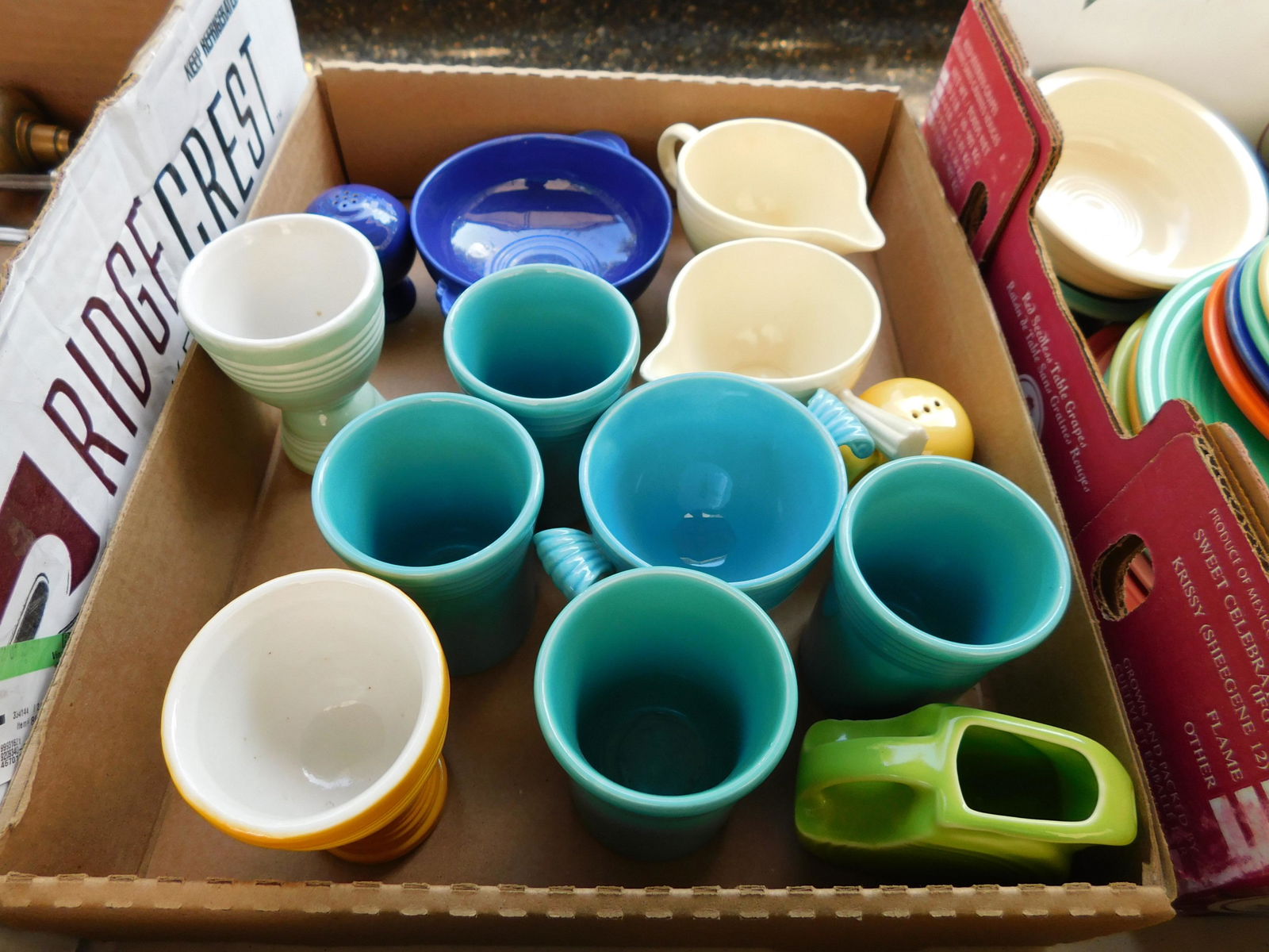 Box Lot of Fiestaware: Box Lot of Fiestaware. You are bidding at a live sale. Please read the terms and conditions. This sale will be broadcast live on sale day with full descriptions of each lot being sold, as well as vide