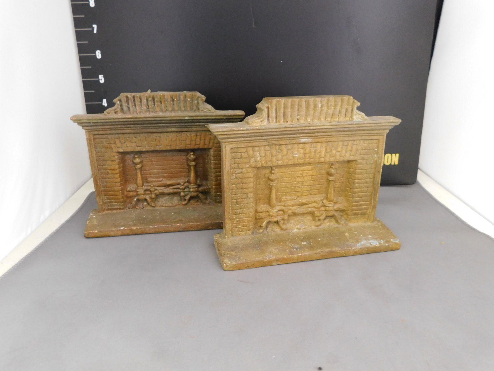 Pair of Cast Iron Fireplace Bookends: Pair of Cast Iron Fireplace Bookends. Measures approx 5" t x 6" w. You are bidding at a live sale, please read the terms and conditions. We are offering contact-less pick ups at our South Brunswick lo