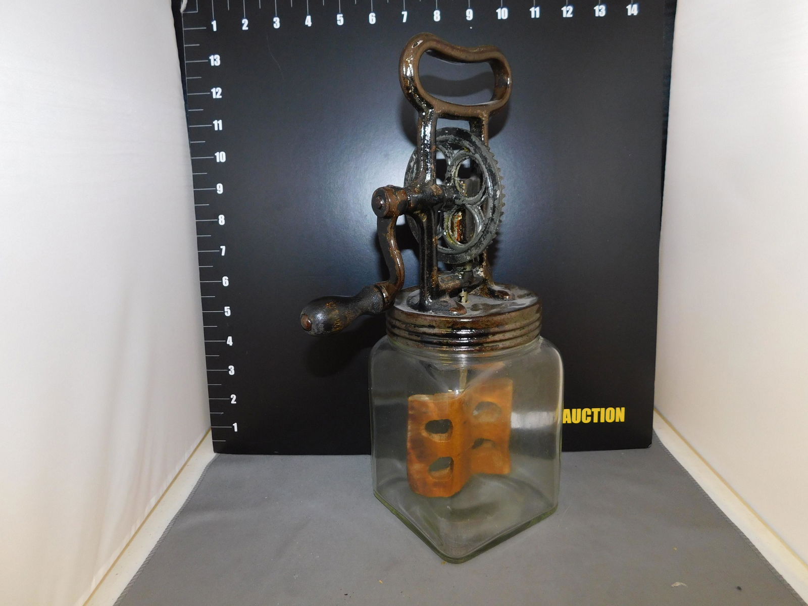 Butter Churn: Butter Churn. Measures approx 11" t x 4" w. You are bidding at a live sale, please read the terms and conditions. We are offering contact-less pick ups at our South Brunswick location by APPOINTMENT O