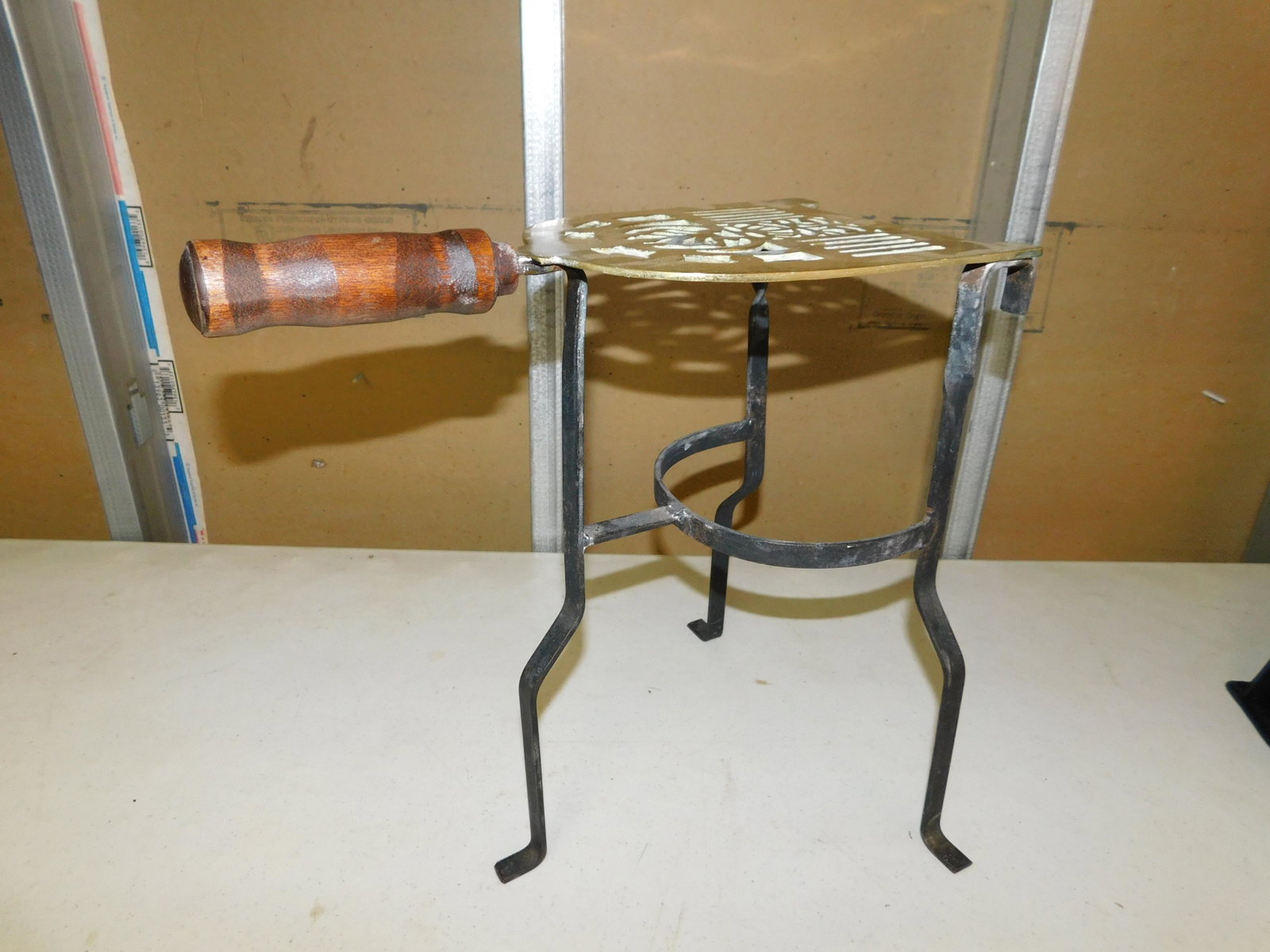 Fireplace Sand Iron Holder: Fireplace Sand Iron Holder. Measures approx. 14" t x 15" w. You are bidding at a live sale, please read the terms and conditions. We are offering contact-less pick ups at our South Brunswick location 