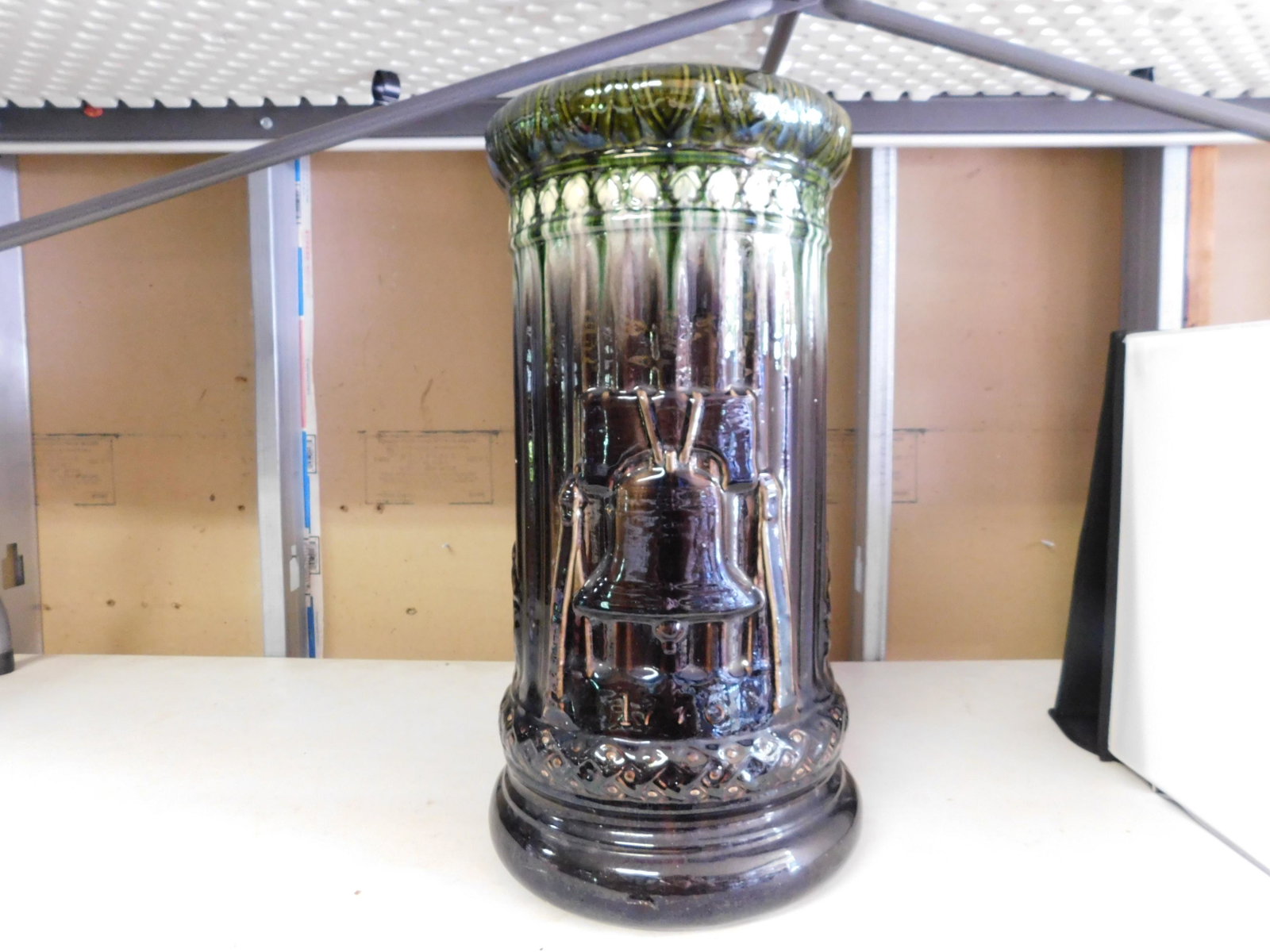 Majolica Umbrella Stand: Majolica Umbrella Stand with Independence Hall and Liberty Bell. Measures approx. 22" t x 12" w. You are bidding at a live sale, please read the terms and conditions. We are offering contact-less pick