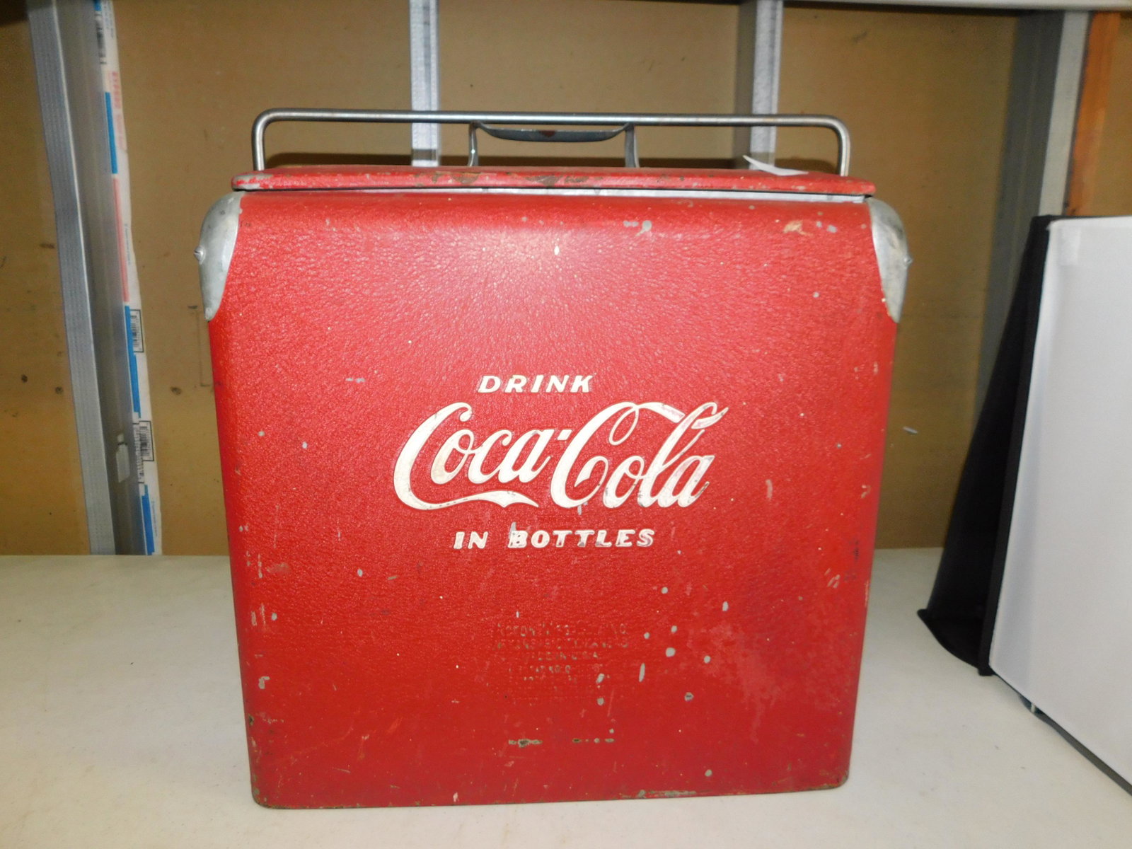 Vintage Coca Cola Tin Advertising Cooler: Vintage Coca Cola Tin Advertising Cooler. Measures 17" t x 12" w. You are bidding at a live sale, please read the terms and conditions. We are offering contact-less pick ups at our South Brunswick loc