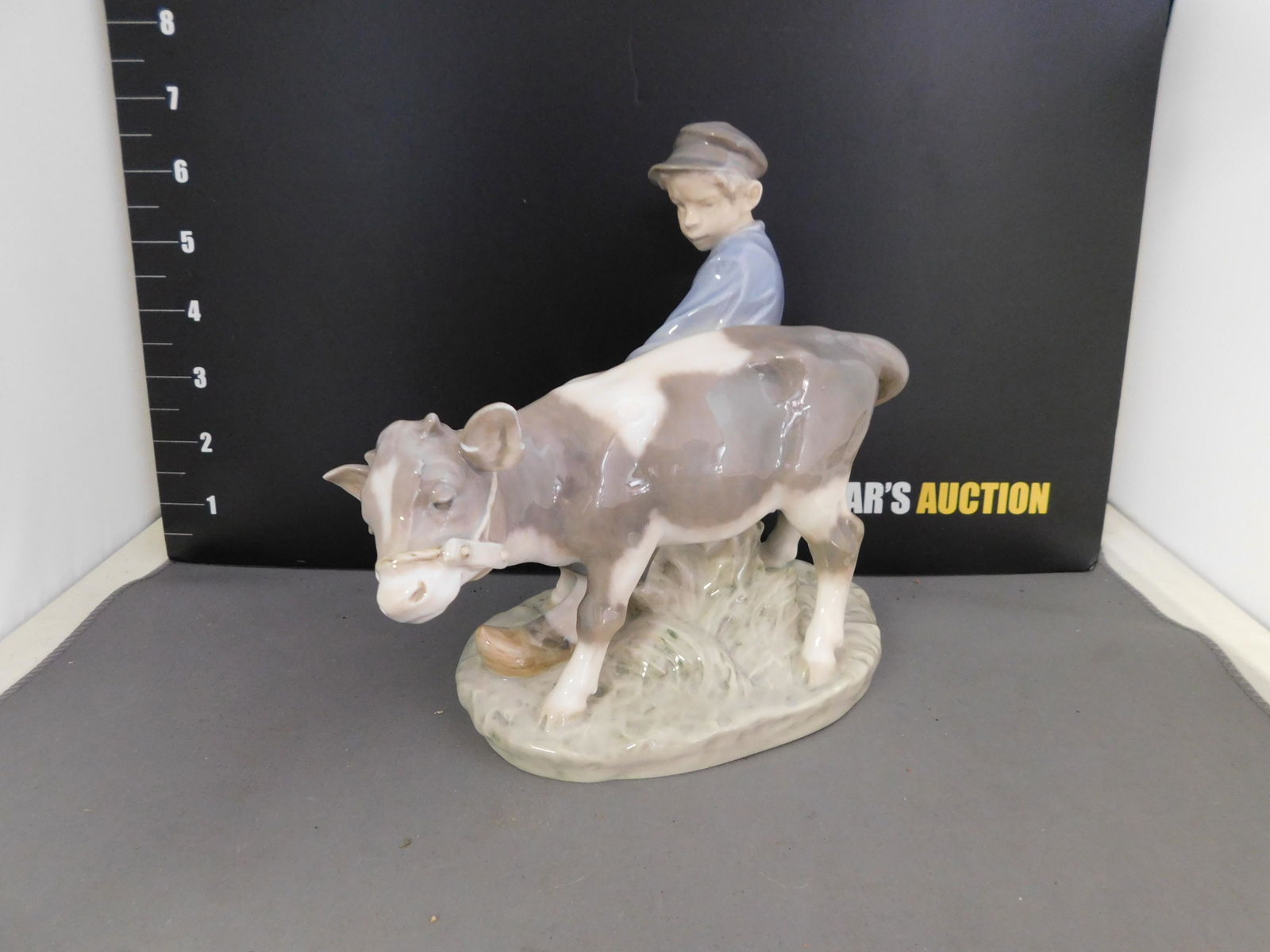 Royal Copenhagen Young Boy with Calf Figurine (1 of 3)