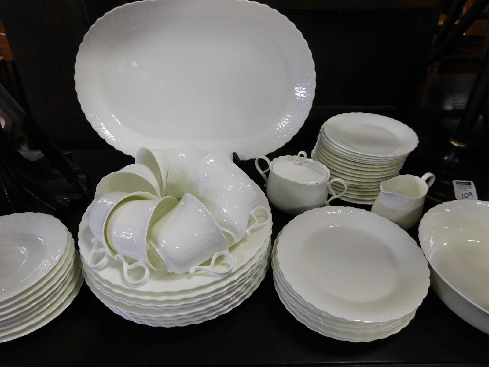 60 Pieces Mikasa White Silk Dinnerware: 60 Pieces Mikasa White Silk Dinnerware. You are bidding at a live sale. Please read the terms and conditions. This sale will be broadcast live on sale day with full descriptions of each lot being sold