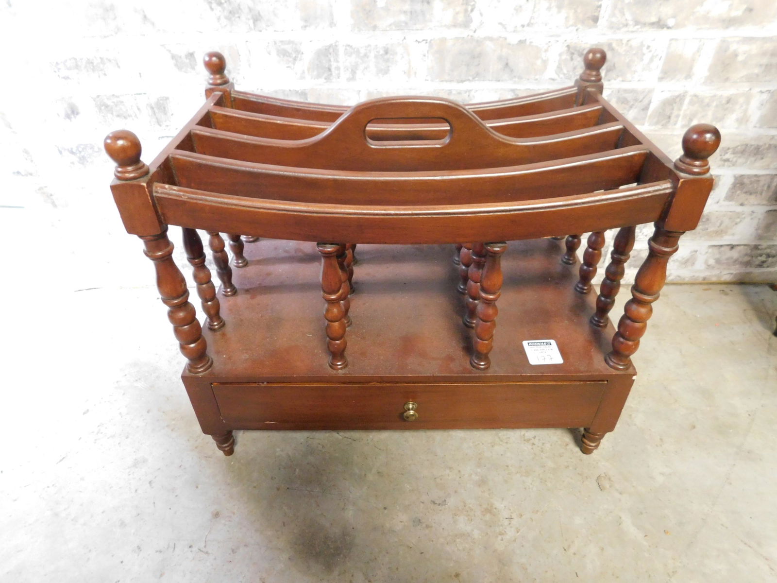 Mahogany 1 Drawer Magazine Rack: Mahogany 1 Drawer Magazine Rack. You are bidding at a live sale. Please read the terms and conditions. This sale will be broadcast live on sale day with full descriptions of each lot being sold, as we