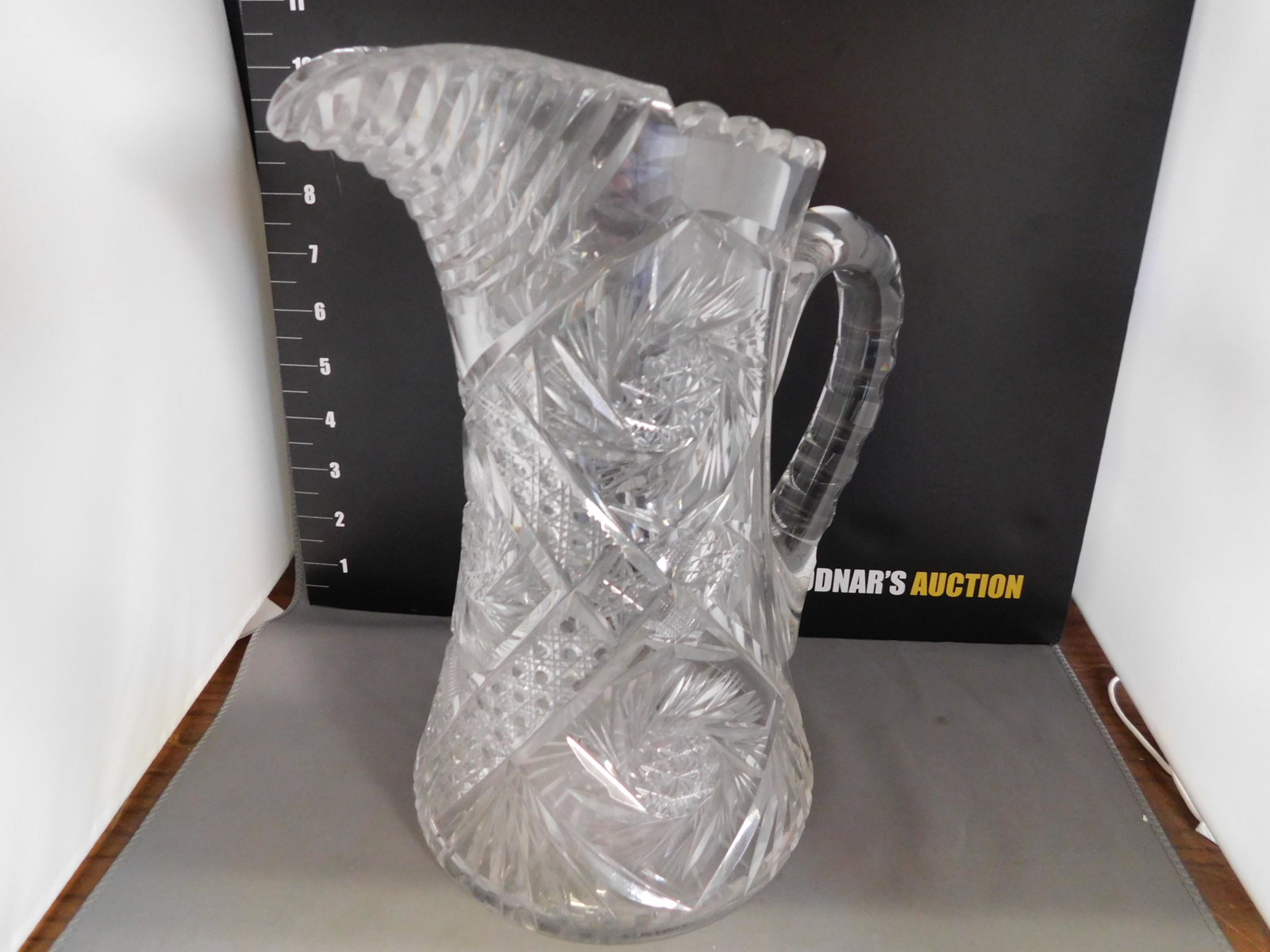 Victorian Brilliant Cut Crystal Pitcher: Victorian Brilliant Cut Crystal Pitcher. Haley's Comet Measures 10.5" tall. You are bidding at a live sale, please read the terms and conditions. We are offering contact-less pick ups at our South Bru