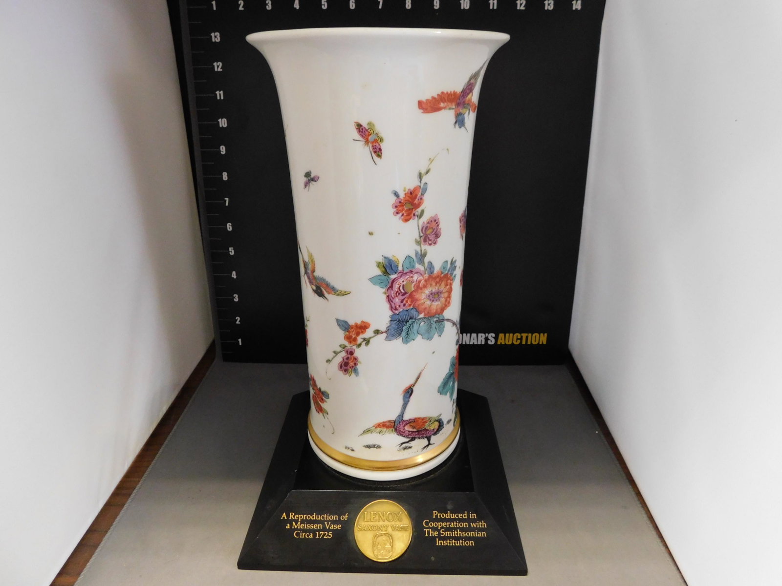 Lenox Saxony Vase: Lenox Saxony Vase with Base. Reproduction of Meissen Vase from 1725. Measures approx. 11" high. You are bidding at a live sale, please read the terms and conditions. We are offering contact-less pick 