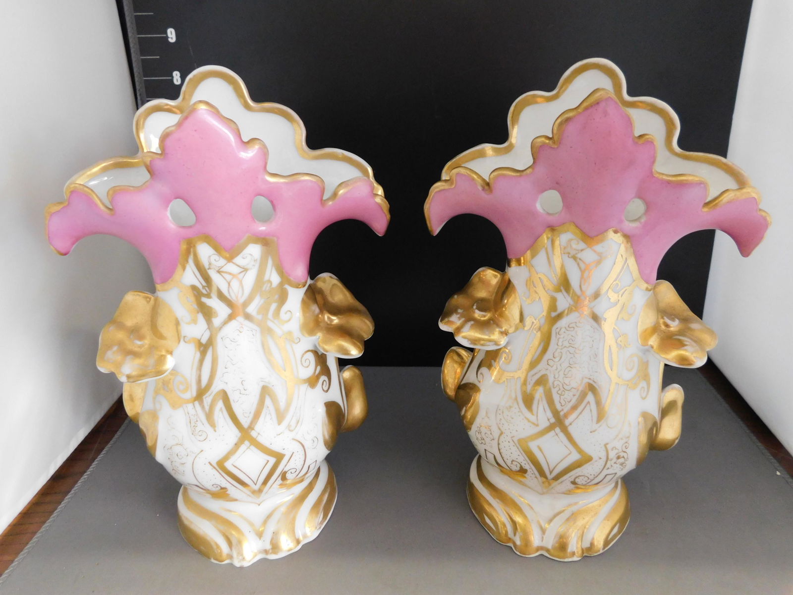 Pair of Old Paris Vases: Pair of Old Paris Vases with satin finished gold. Measures approx. 8.5" tall. You are bidding at a live sale, please read the terms and conditions. We are offering contact-less pick ups at our South B