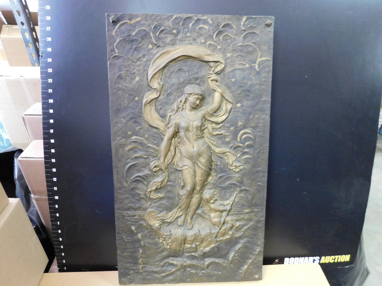Metal Relief Plaque of Venus: Metal Relief Plaque of Venus. Measures 27" l x 15" w. You are bidding at a live sale, please read the terms and conditions. We are offering contact-less pick ups at our South Brunswick location by APP