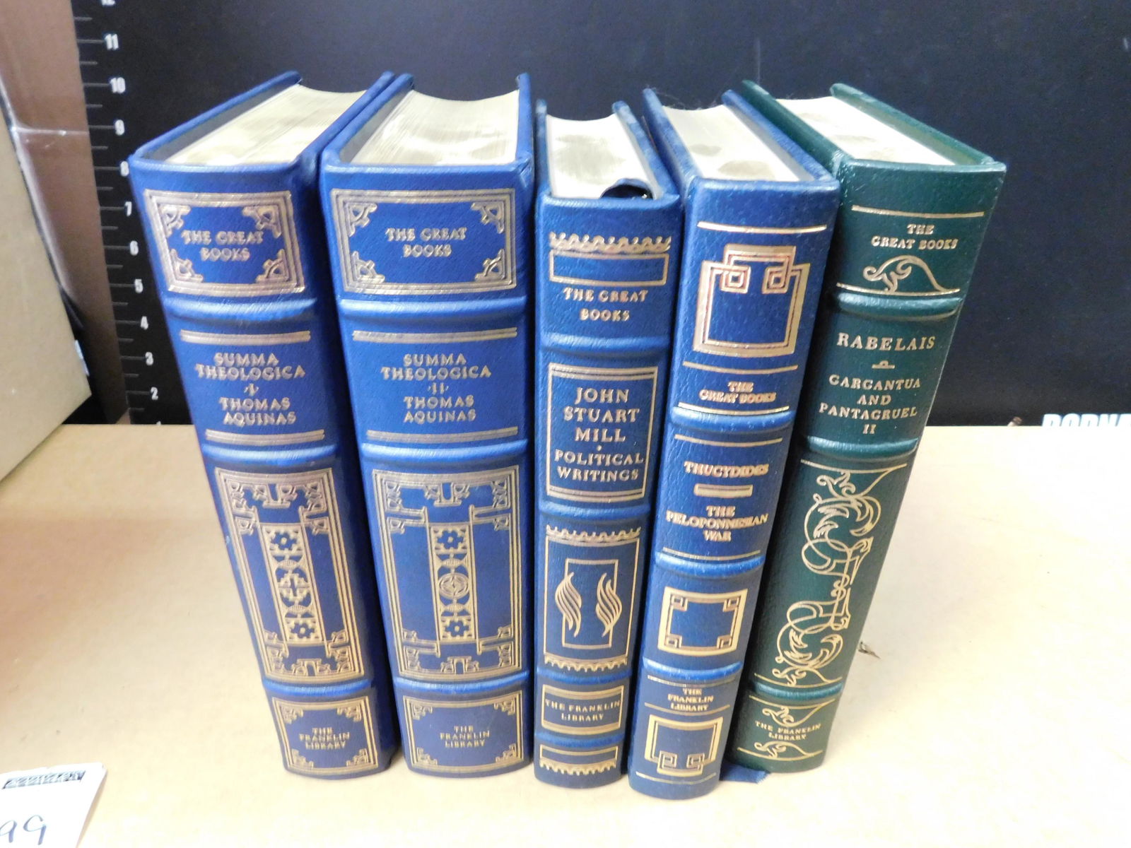Lot of 5 Franklin Library Books: Lot of 5 Franklin Library Books. Included in this lot are 2 Volumes of Summa Theologica by Thomas Aquinas, Political Writings by John Stuart Mill, The Peloponnesian War by Thucydides, Carcantua and Pa
