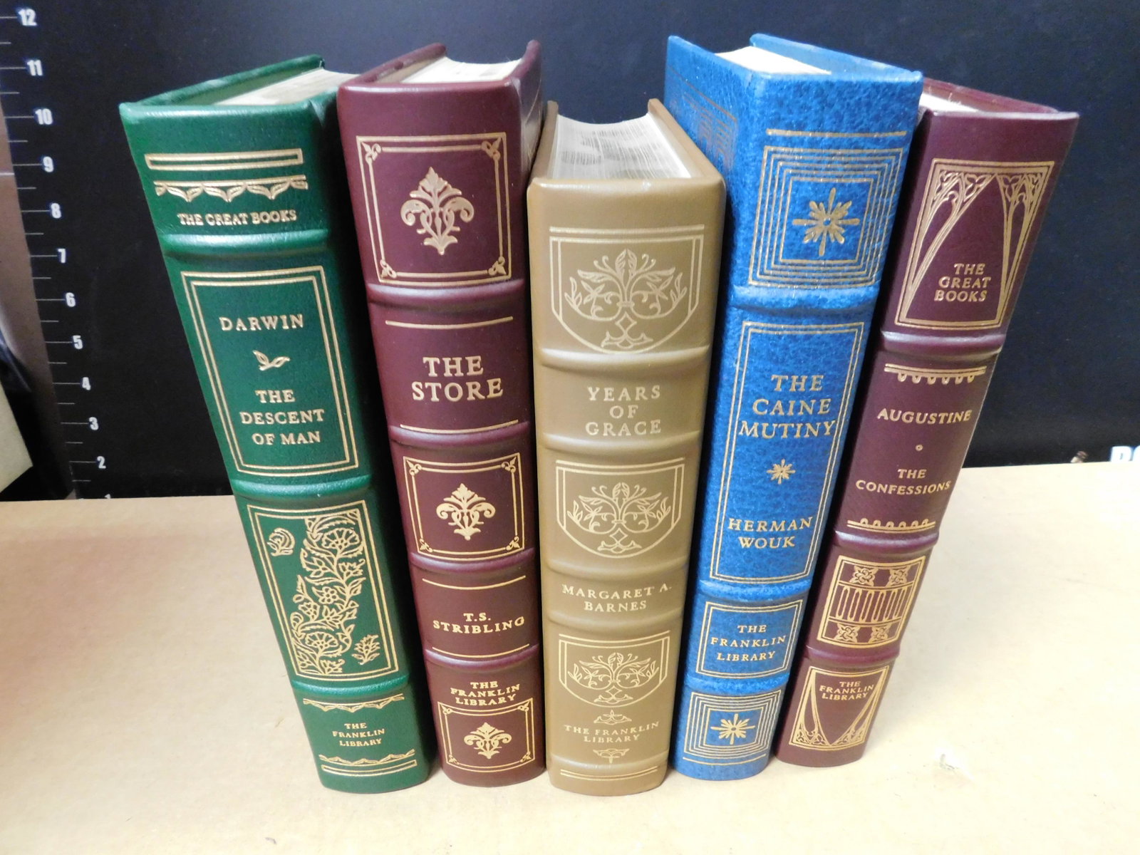 Lot of 5 Franklin Library Books: Lot of 5 Frankin Library Books. Included in this lot are The Decent of Man by Darwin, The Store by T.S. Stribling, Years of Grace by Margaret A. Barnes, The Caine Mutiny by Herman Wouk, and The Confes