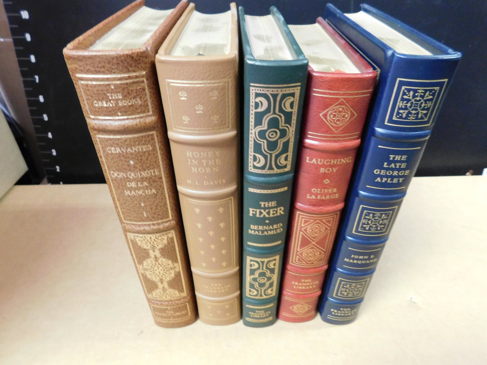 Lot of 5 Franklin Library Books: Lot of 5 Franklin Library Books. Included in this lot are Don Quixote by Cervantes Vol 1, Honey in the Horn by H.L. Davis, The Fixer by Bernard Malamud, Laughing Boy by Oliver Lafarge, and The Late Ge