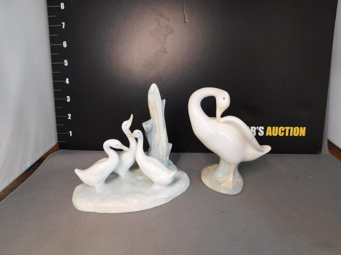 Lot of 2 Lladro and Nao Goose Figures: Lot of 2 Figurines including Lladro Goose and Nao Goose. Measures 4.25" tall. You are bidding at a live sale, please read the terms and conditions. We are offering contact-less pick ups at our South B