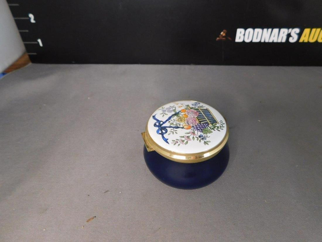Staffordshire Enameled Trinket Box: Staffordshire Enamels Small Enamel Trinket Box. Measures 1.5" tall x 2" w. You are bidding at a live sale, please read the terms and conditions. We are offering contact-less pick ups at our South Brun