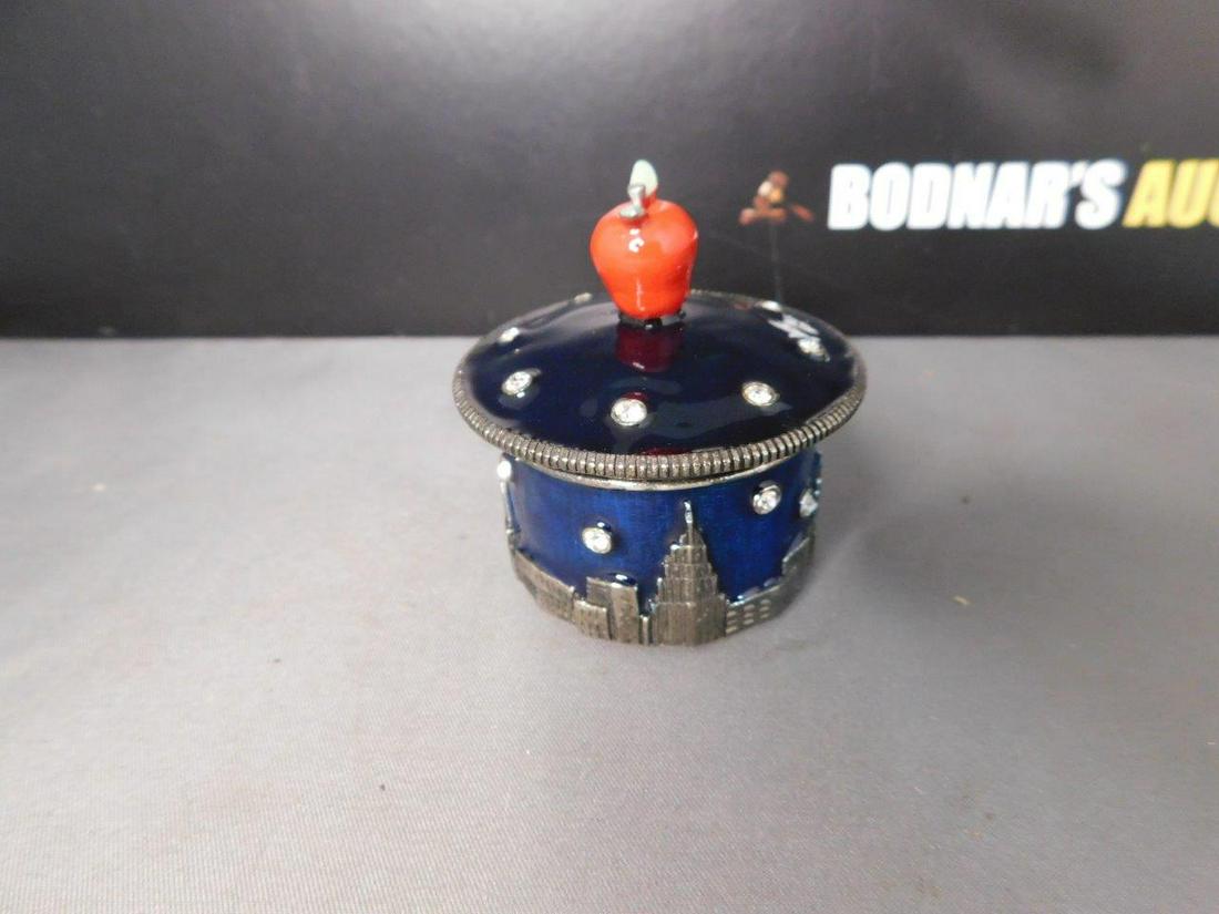 Yosca Enameled Trinket Box: Yosca Enameled and Jewel Trinket Box of Twin Towers. You are bidding at a live sale, please read the terms and conditions. We are offering contact-less pick ups at our South Brunswick location by APPO