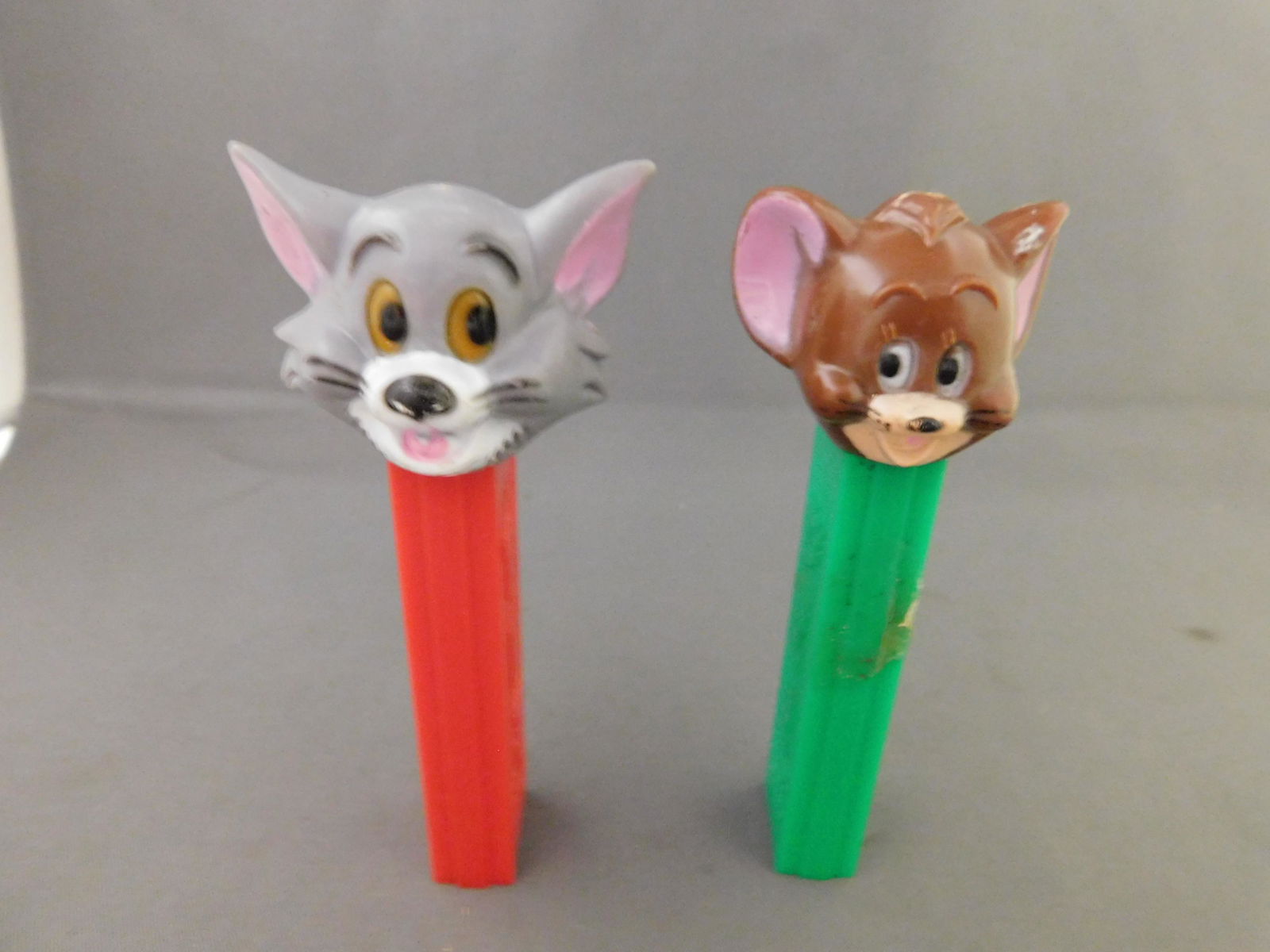 Tom and Jerry Vintage Pez Lot of 2: Tom and Jerry Vintage Pez Lot of 2. They both have no feet. Both are made in Hong Kong. You are bidding at a live sale, please read the terms and conditions. We are offering contact-less pick ups at o