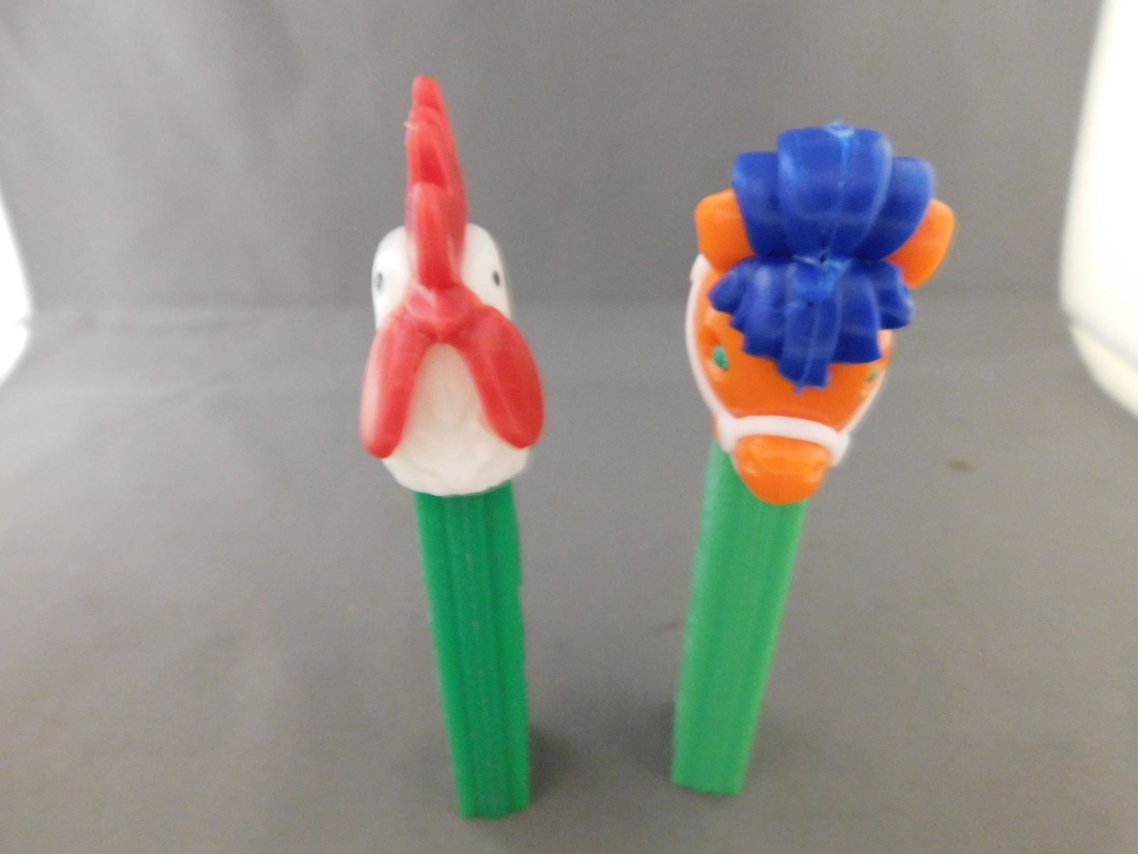 Vintage Rooster and Pony Lot: Vintage Rooster and Pony Pez Lot. They both have no feet. Both are made in Austria. You are bidding at a live sale, please read the terms and conditions. We are offering contact-less pick ups at our S