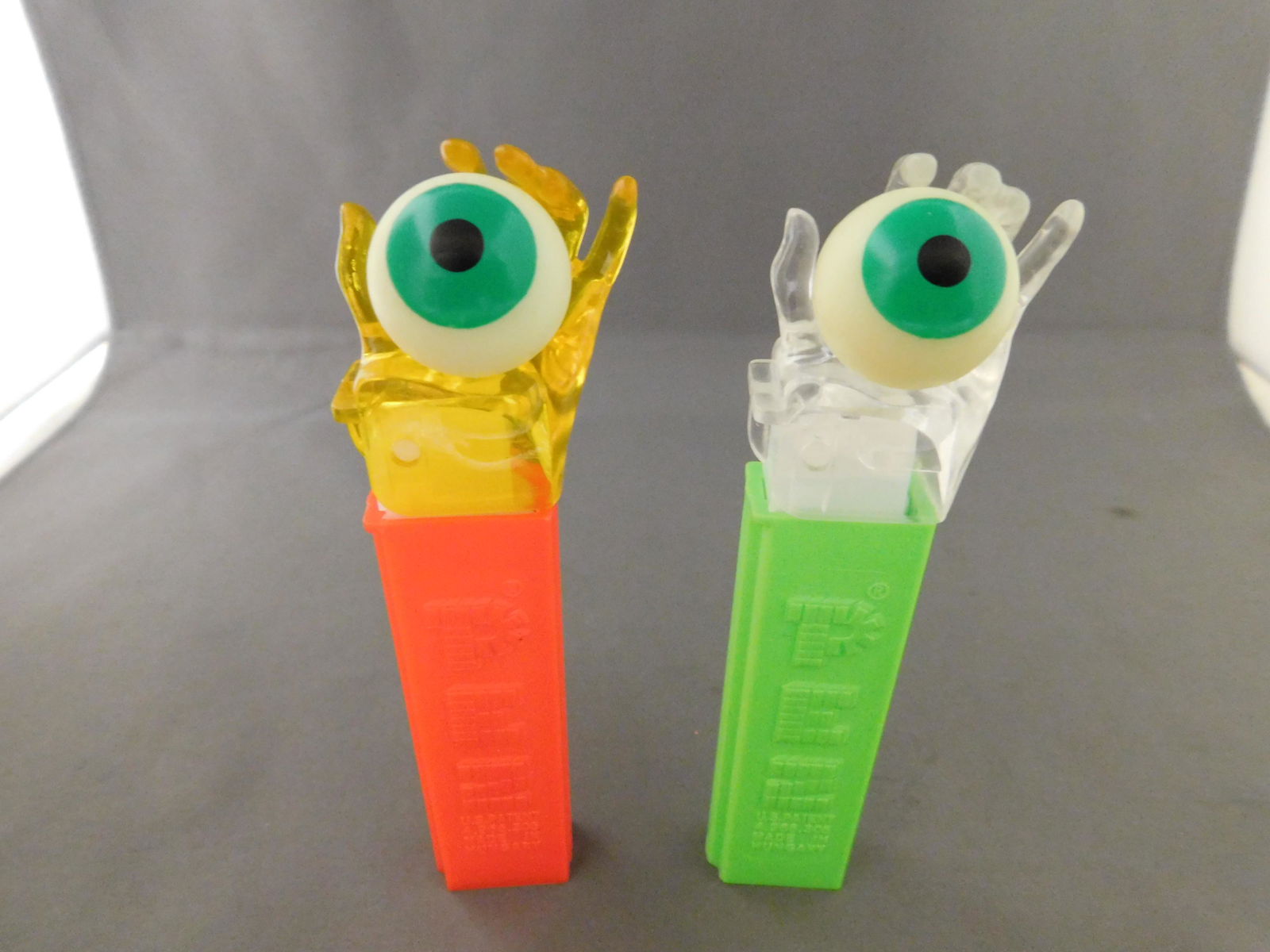 Pez Eyeball in Hand Lot: Vintage Pez Eyeball in Hand Lot of 2. They both have no feet. Both are made in Hungary. You are bidding at a live sale, please read the terms and conditions. We are offering contact-less pick ups at o