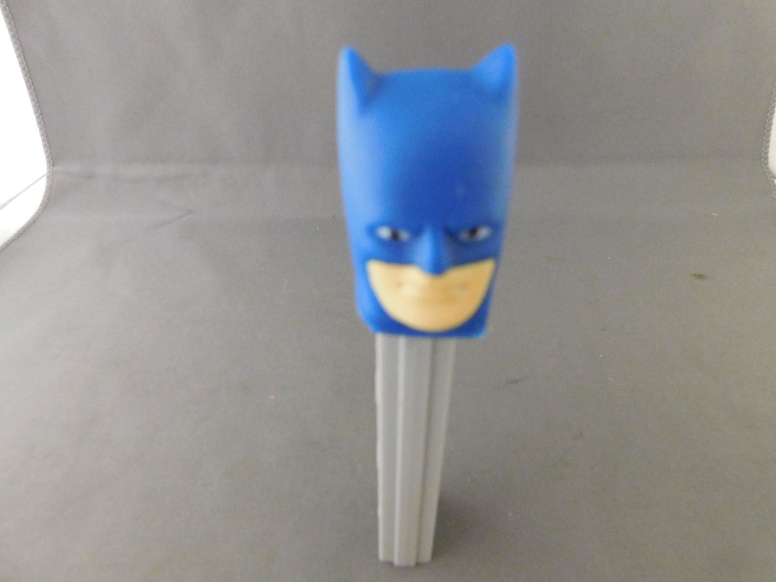 Vintage Soft Head Batman Pez: Vintage Soft Head Batman Pez. He has no feet. Head made in Hong Kong. Body made in USA. You are bidding at a live sale, please read the terms and conditions. We are offering contact-less pick ups at o