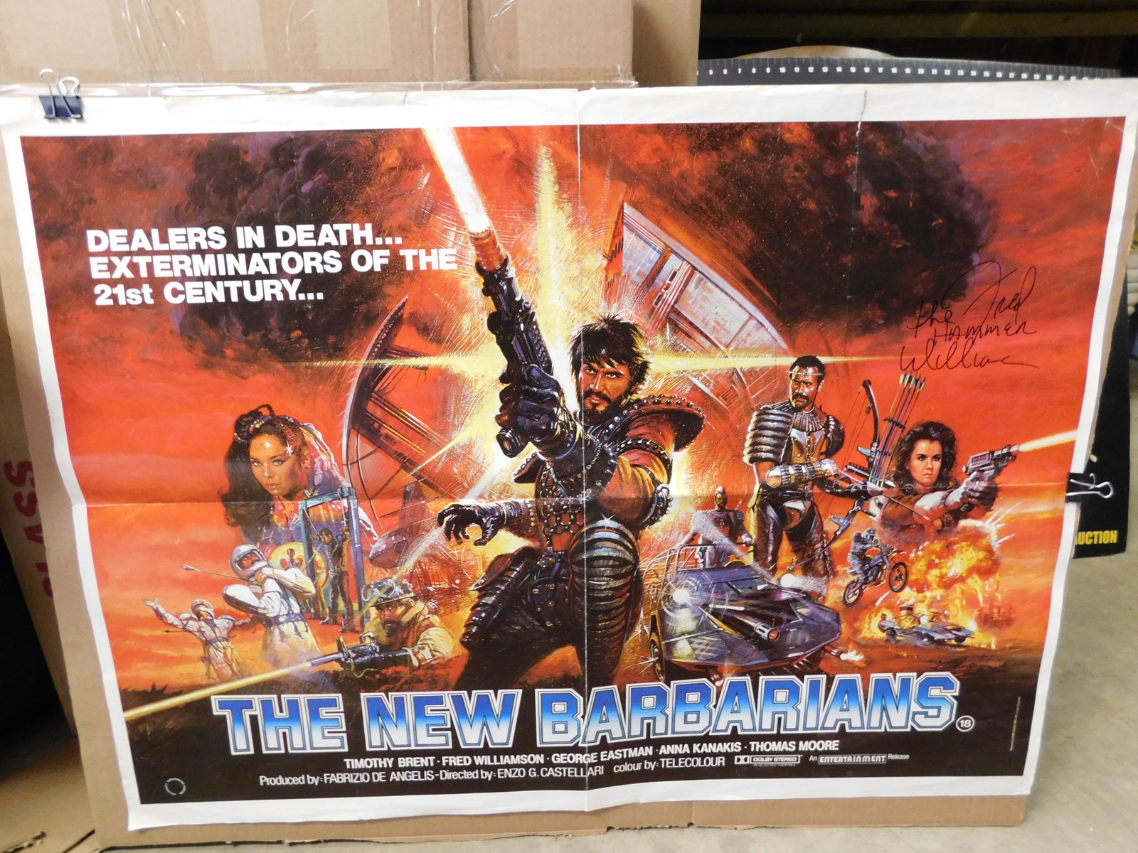 The New Barbarians Signed Movie Poster: The New Barbarians Movie Poster. Signed "Fred the Hammer Williamson" Folded with some tears. Measures 28.5" tall x 40" w. You are bidding at a live sale, please read the terms and conditions. We are o