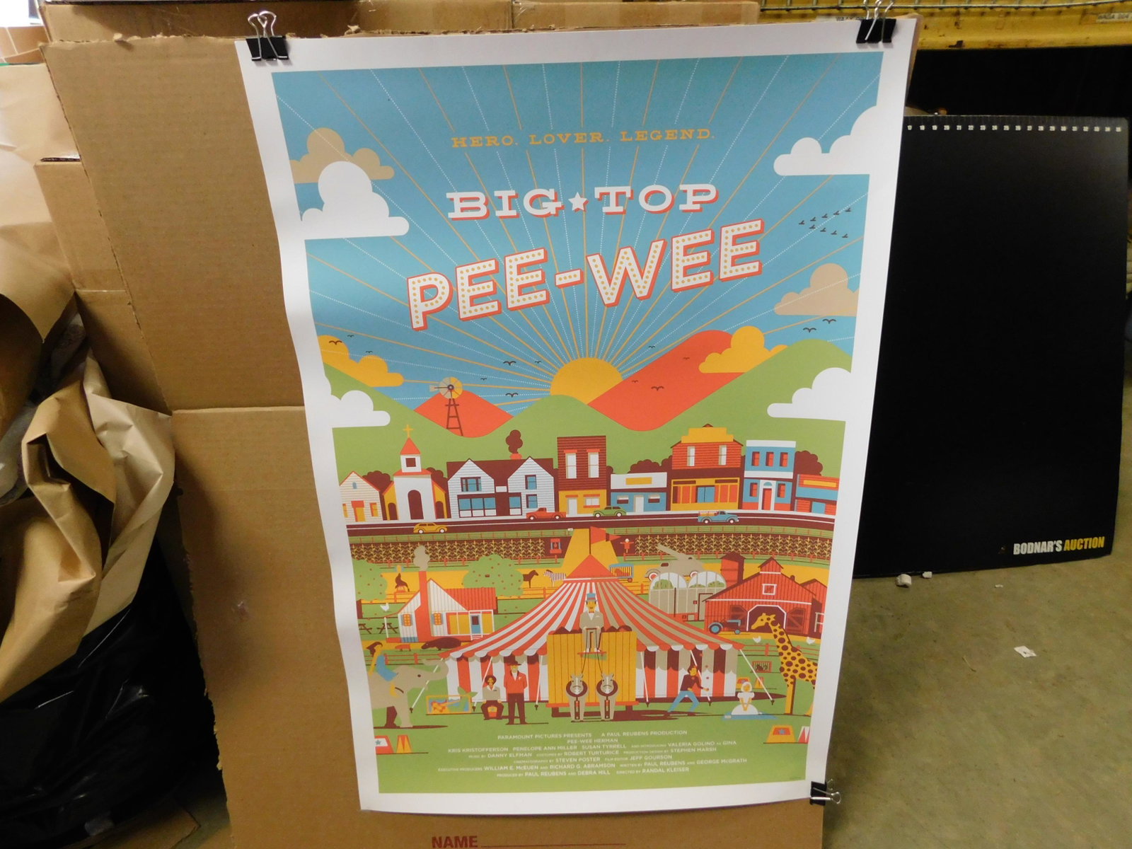 Big Top Pee-Wee Mondo: Big Top Pee-Wee Mondo Print by DKNG. Limited #113/150. Rolled in Good Condition. Measures 36" Tall x 24" w. You are bidding at a live sale, please read the terms and conditions. We are offering contac