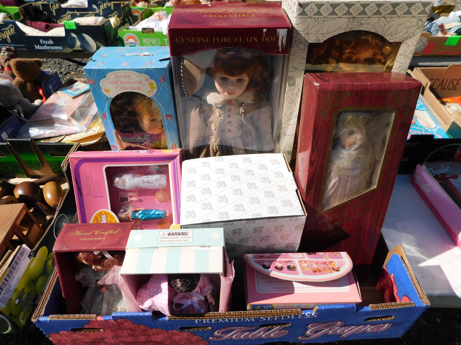 Large Lot of Boxed Dolls: Large Lot of Boxed Dolls. You are bidding at a live sale. Please read the terms and conditions. This sale will be broadcast live on sale day with full descriptions of each lot being sold, as well as v