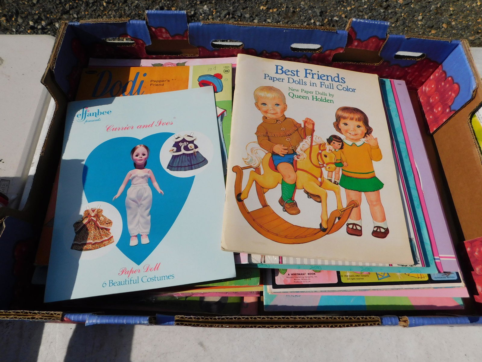 Large Lot of Paper Doll Books: Large Lot of Paper Doll Books. You are bidding at a live sale. Please read the terms and conditions. This sale will be broadcast live on sale day with full descriptions of each lot being sold, as well