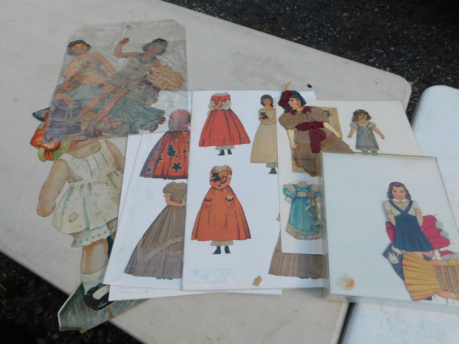 Large Lot of Boarded Paper Dolls: Large Lot of Boarded Paper Dolls. You are bidding at a live sale. Please read the terms and conditions. This sale will be broadcast live on sale day with full descriptions of each lot being sold, as w