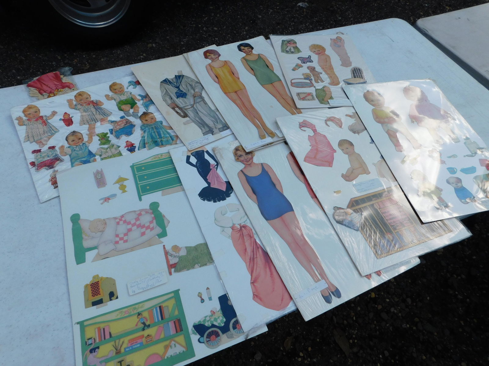 Large Lot of Boarded Paper Dolls: Large Lot of Boarded Paper Dolls. You are bidding at a live sale. Please read the terms and conditions. This sale will be broadcast live on sale day with full descriptions of each lot being sold, as w