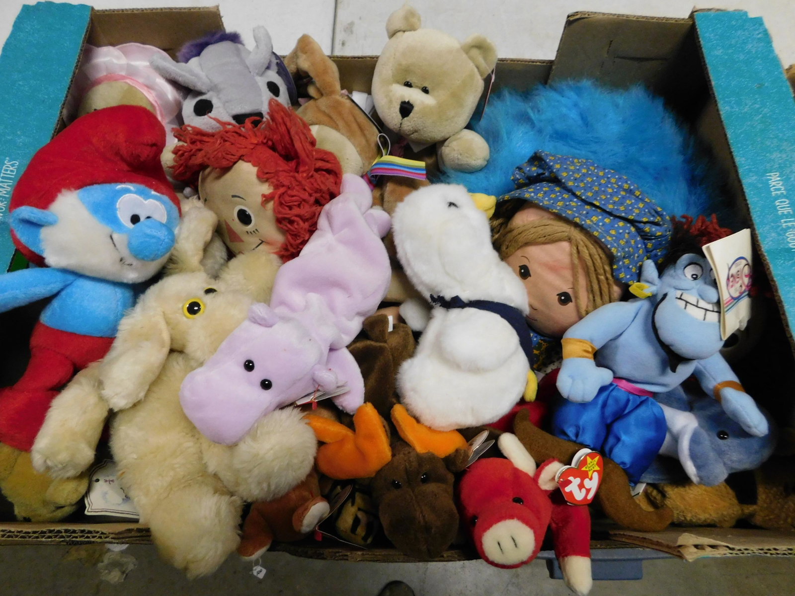 Lot of Plush including Beanie Babies and Disney Store: Lot of Plush including Beanie Babies and Disney Store. You are bidding at a live sale. Please read the terms and conditions. This sale will be broadcast live on sale day with full descriptions of each