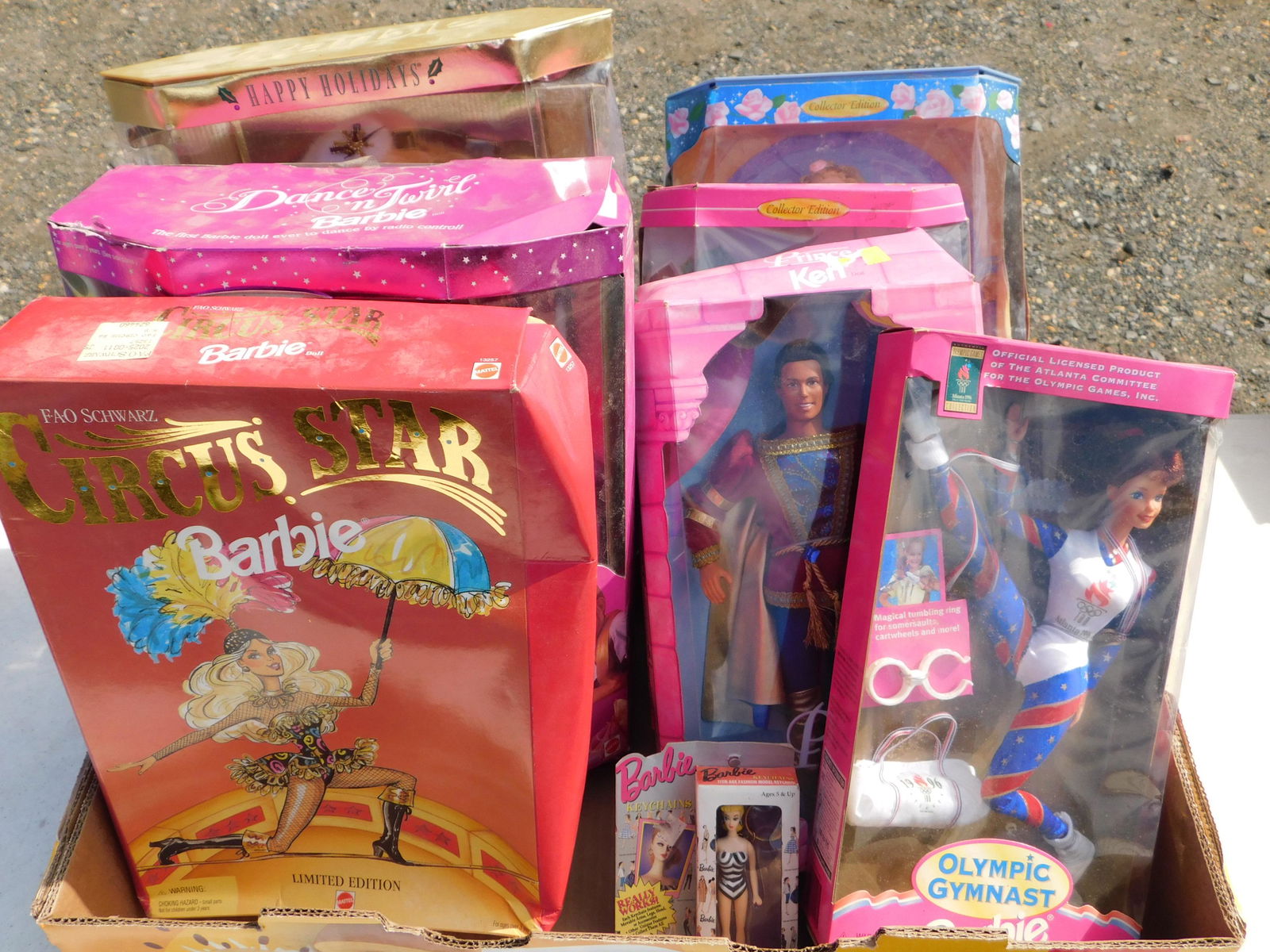 Box Lot of Barbie's: Box Lot of Barbie's. You are bidding at a live sale. Please read the terms and conditions. This sale will be broadcast live on sale day with full descriptions of each lot being sold, as well as video