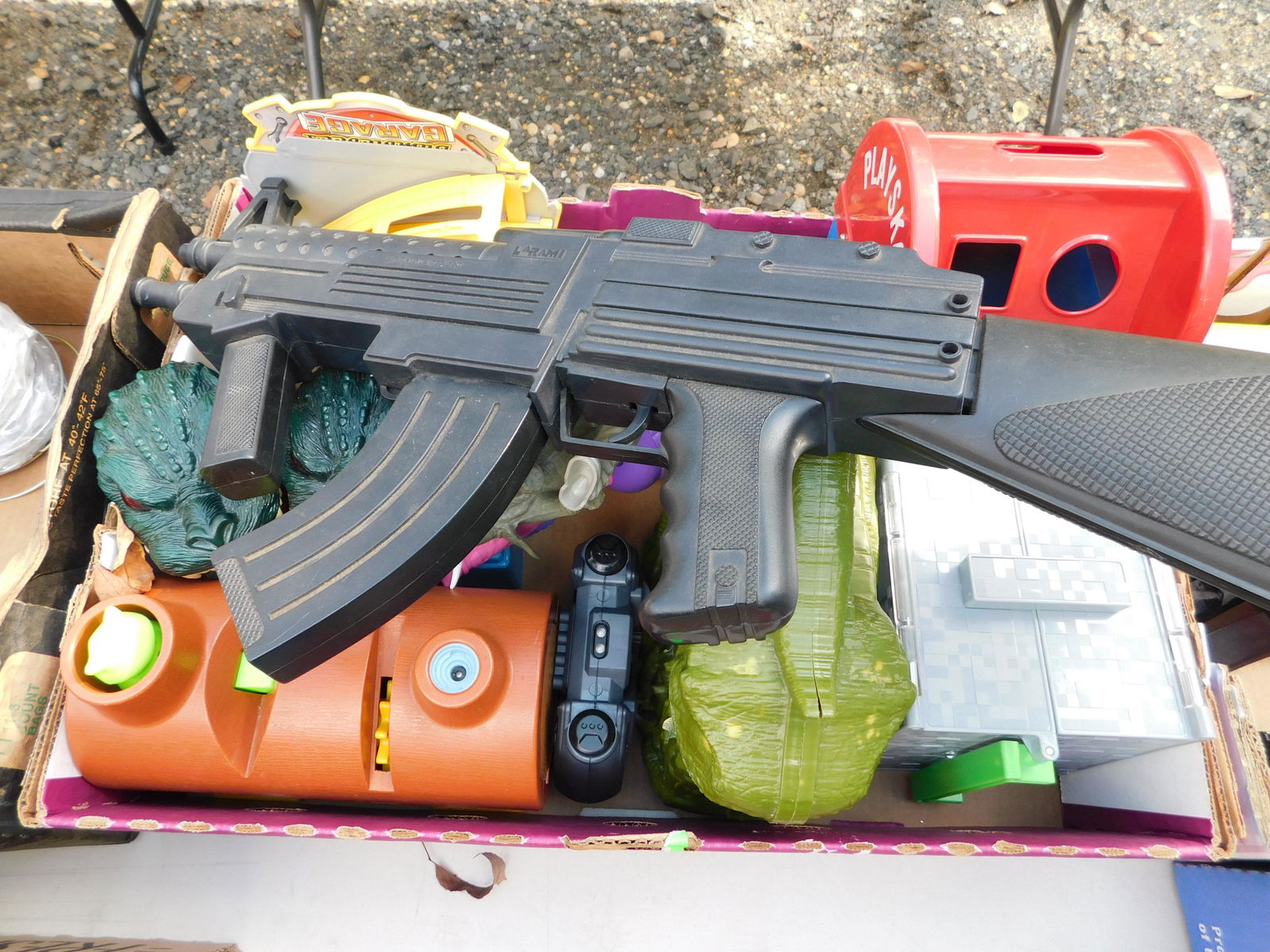 Box Lot of Children's Toys: Box Lot of Children's Toys. You are bidding at a live sale. Please read the terms and conditions. This sale will be broadcast live on sale day with full descriptions of each lot being sold, as well as