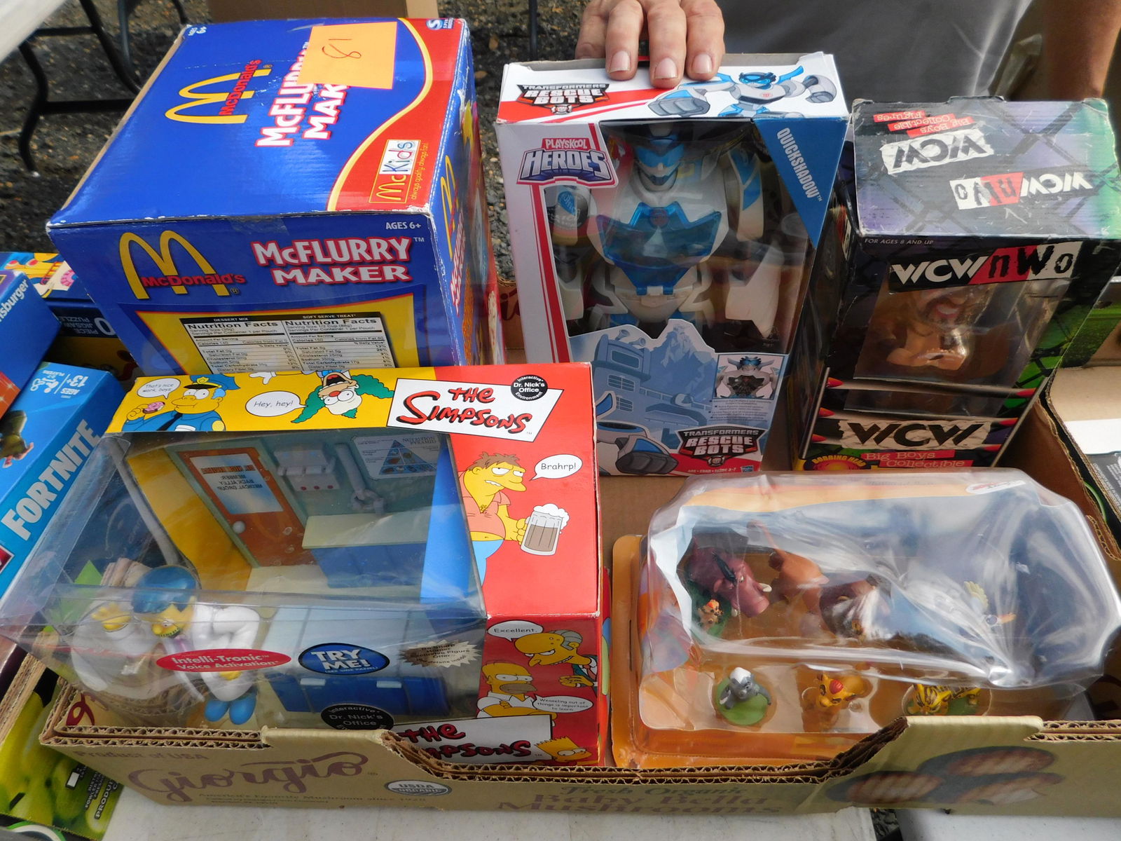 Box Lot with Simpsons: Box Lot with Simpsons. You are bidding at a live sale. Please read the terms and conditions. This sale will be broadcast live on sale day with full descriptions of each lot being sold, as well as vide