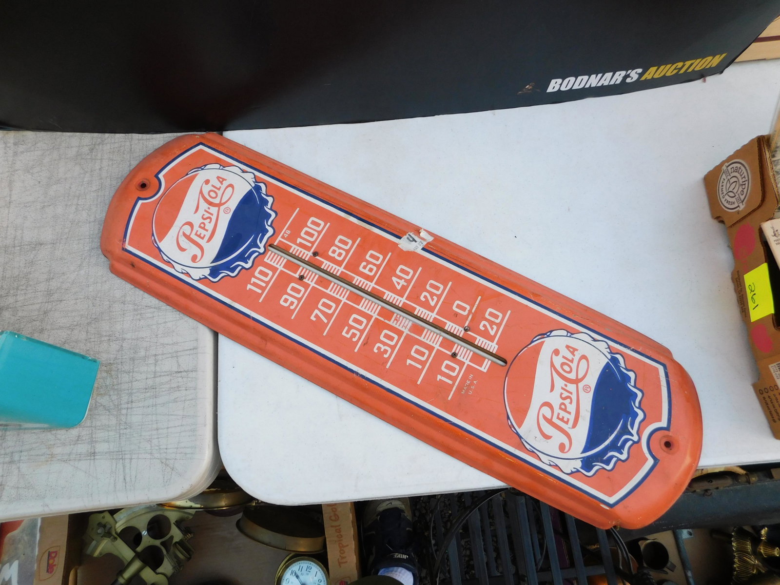 Pepsi-Cola Thermometer: Pepsi-Cola Advertising Thermometer. At least 1980's. You are bidding at a live sale. Please read the terms and conditions. This sale will be broadcast live on sale day with full descriptions of each l
