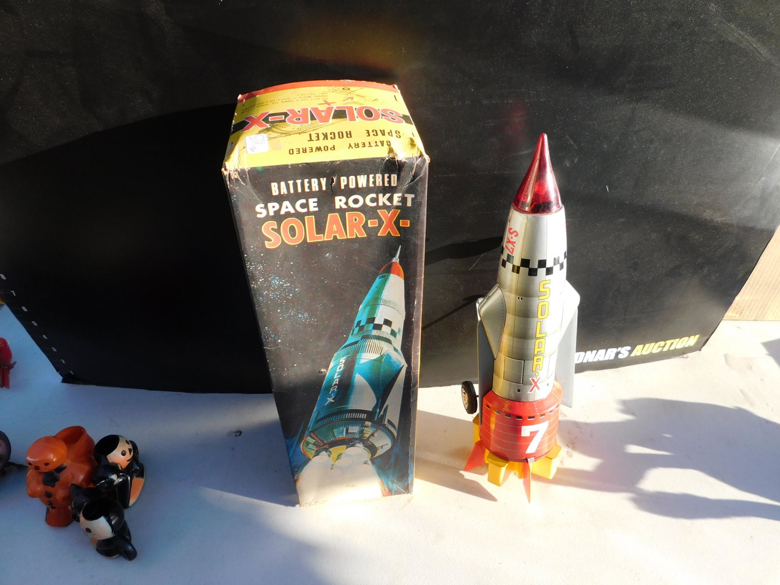 Japanese Battery Operated Solar-X in Box: Japanese Battery Operated Space Rocket Solar-X. In Good Condition with Box. You are bidding at a live sale. Please read the terms and conditions. This sale will be broadcast live on sale day with full
