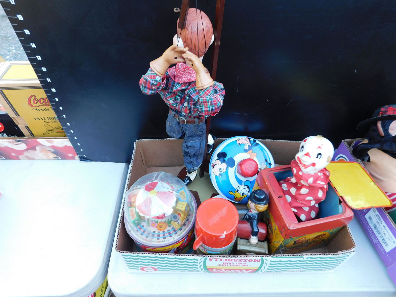 Box Lot of Vintage Toys: Box Lot of Vintage Toys. You are bidding at a live sale. Please read the terms and conditions. This sale will be broadcast live on sale day with full descriptions of each lot being sold, as well as vi