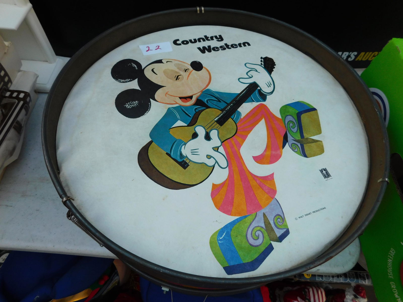 Vintage Country Western Mickey Mouse Drum: Vintage Country Western Mickey Mouse Tin Base Drum. You are bidding at a live sale. Please read the terms and conditions. This sale will be broadcast live on sale day with full descriptions of each lo