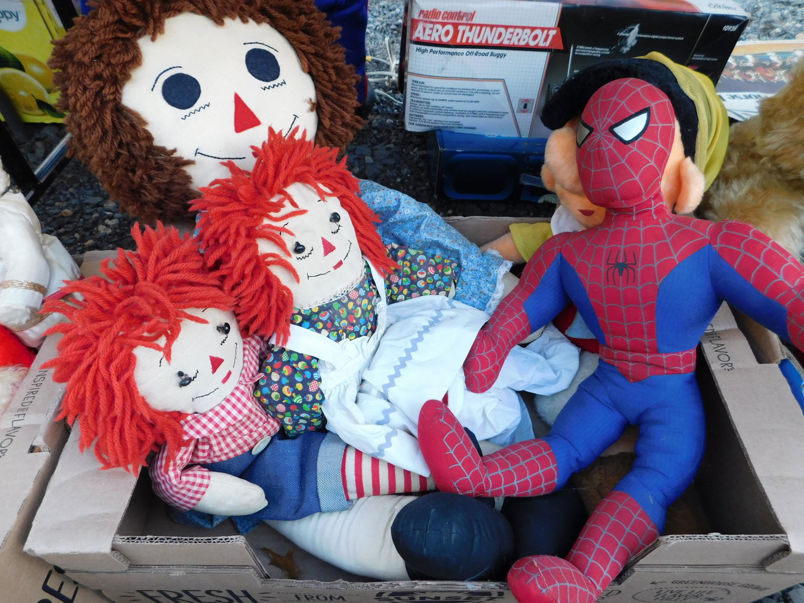 Box Lot with Raggedy Ann and Andy: Box Lot with Raggedy Ann and Andy. You are bidding at a live sale. Please read the terms and conditions. This sale will be broadcast live on sale day with full descriptions of each lot being sold, as
