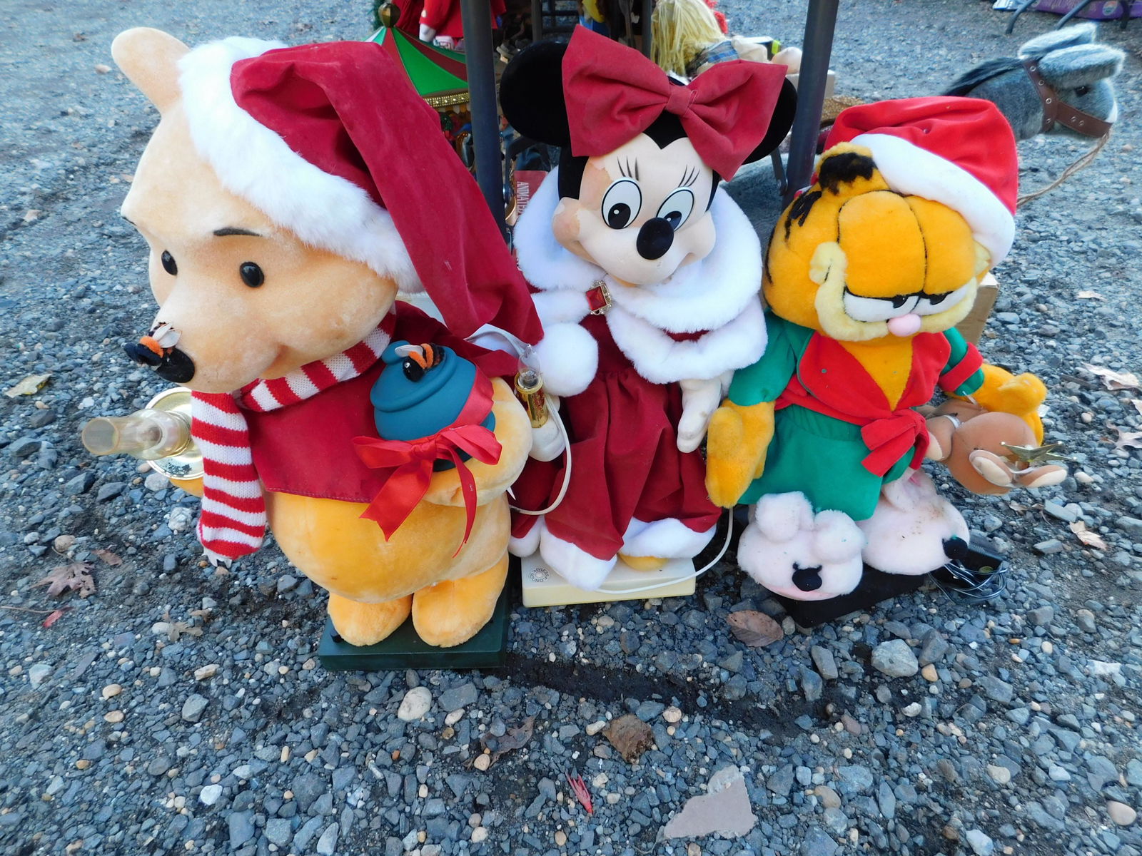 Lot of 3 Mechanical Christmas Dolls including Minnie: Lot of 3 Mechanical Christmas Minnie Mouse, Garfield and Winnie the Pooh. You are bidding at a live sale. Please read the terms and conditions. This sale will be broadcast live on sale day with full d