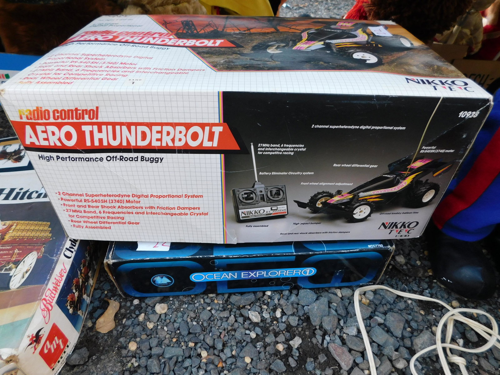 Box Lot of RC Cars and Submarine: Box Lot of Radio Controlled Car and Submarine. You are bidding at a live sale. Please read the terms and conditions. This sale will be broadcast live on sale day with full descriptions of each lot bei
