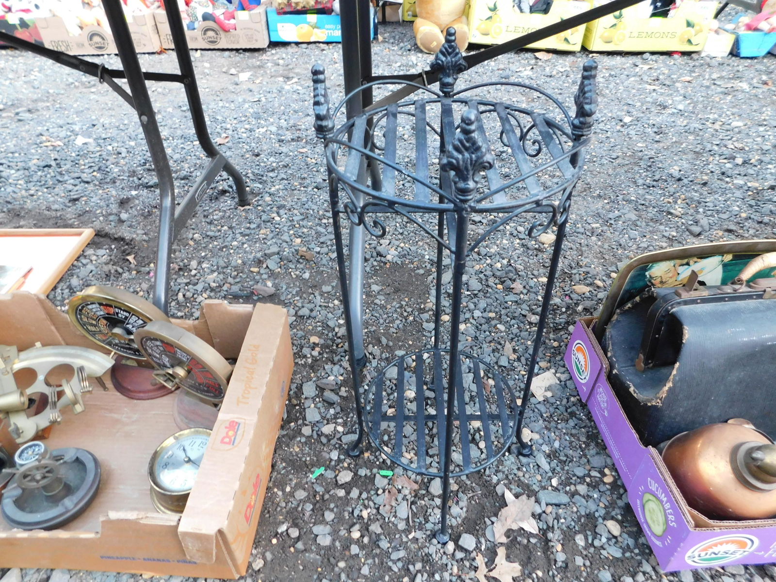 Iron Folding Plant Stand: Iron Folding Plant Stand. You are bidding at a live sale. Please read the terms and conditions. This sale will be broadcast live on sale day with full descriptions of each lot being sold, as well as v