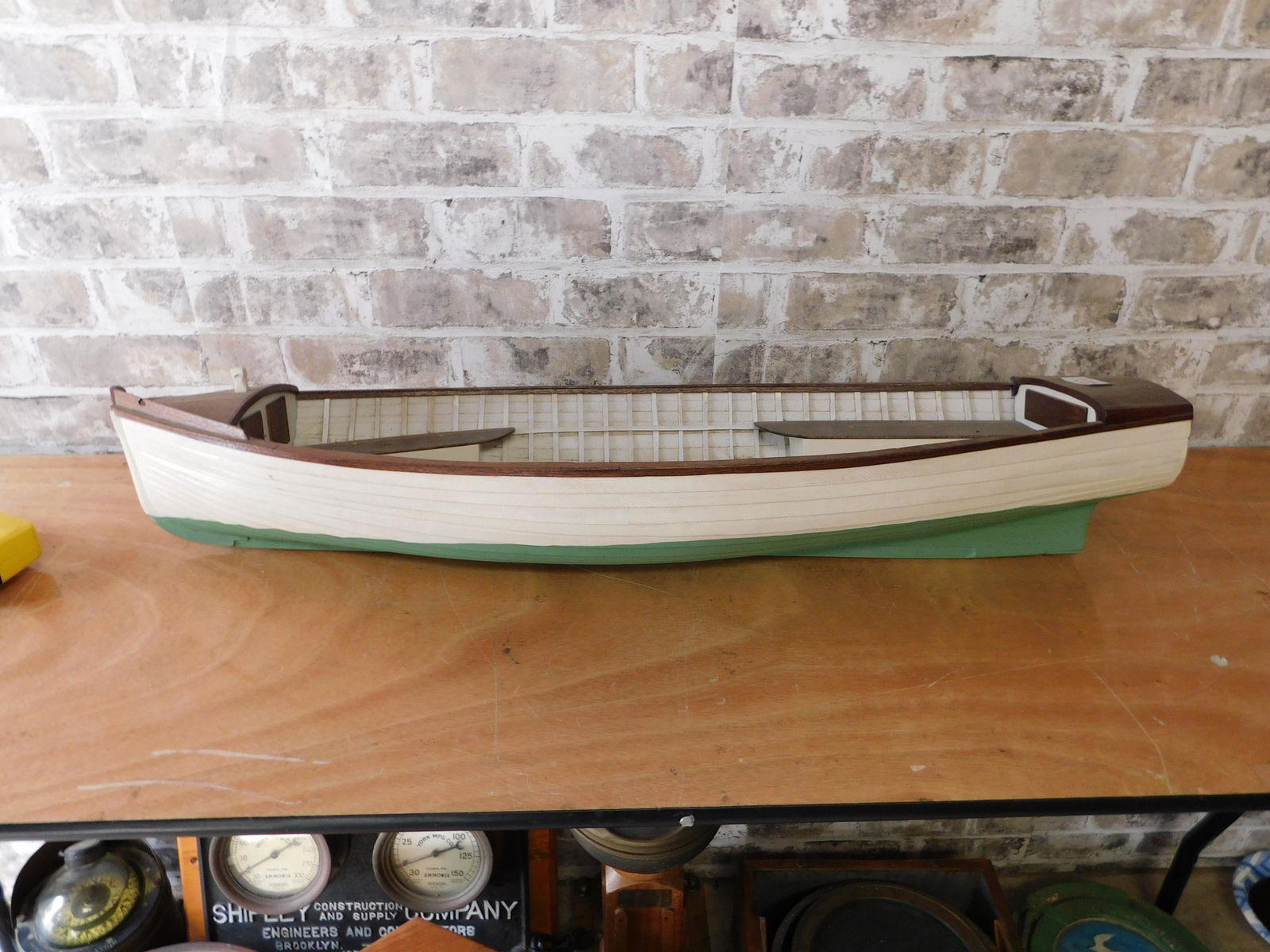 Wooden Ship Model: Wooden Ship Model. Measures 5" tall x 35" long. You are bidding at a live sale. Please read the terms and conditions. This sale will be broadcast live on sale day with full descriptions of each lot be