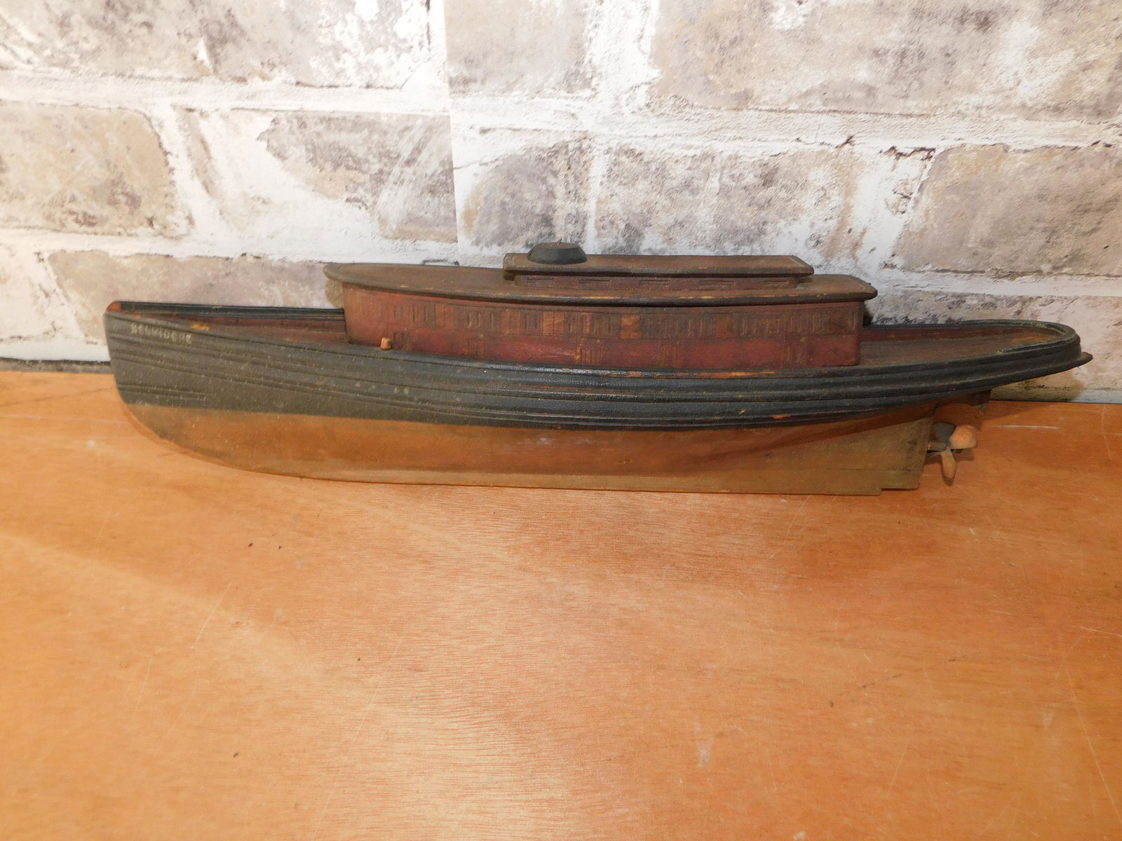 Folk Art Belvedere Wooden Ship Model: Folk Art Style Wooden Ship Model Marked Belvedere. Measures 4" tall x 15" wide. You are bidding at a live sale. Please read the terms and conditions. This sale will be broadcast live on sale day with