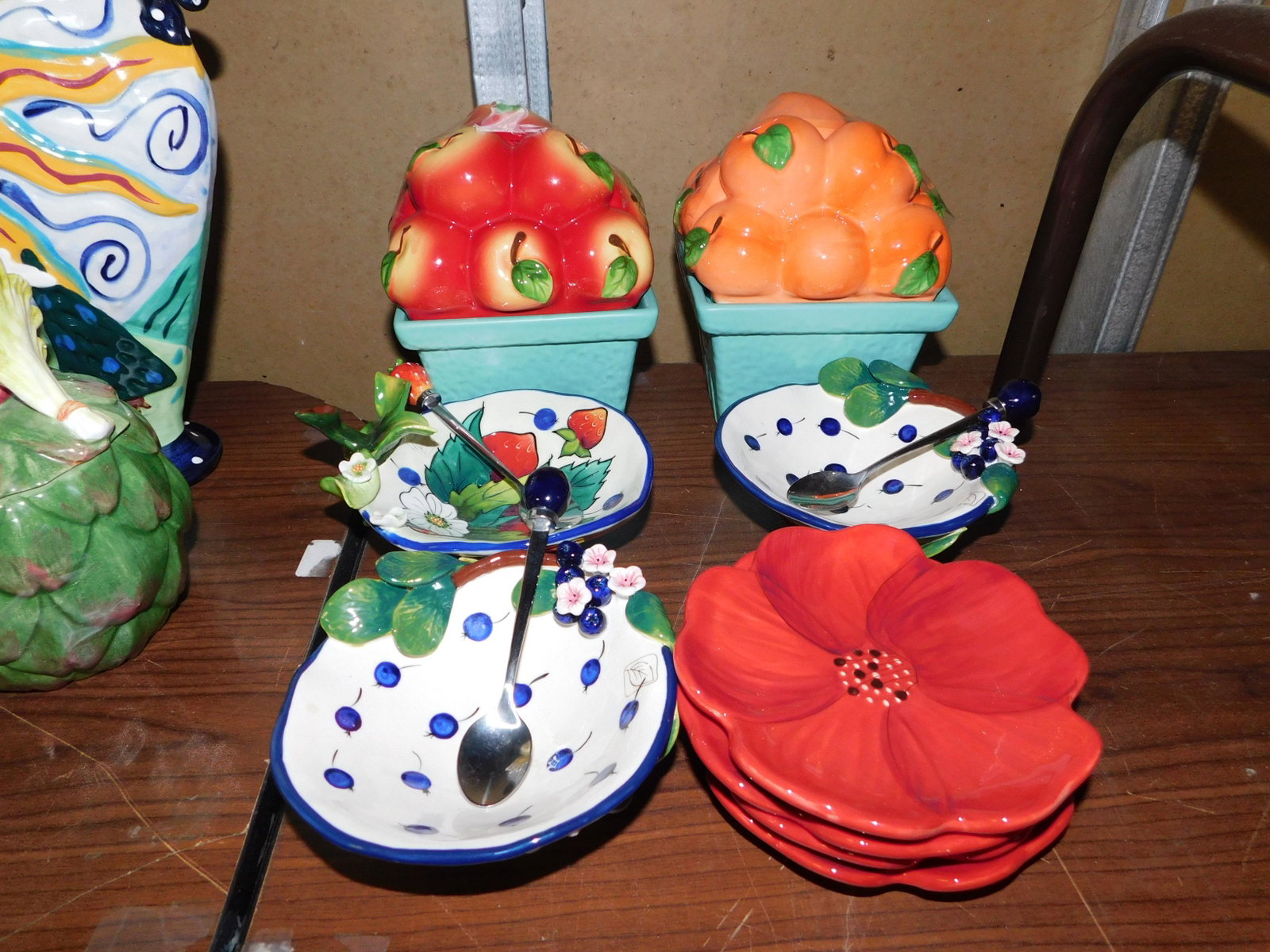 Lot of Decorator Items: Lot of Decorator Items including Pair of Home Works Candle Holders ,Lori Ana bloom Plates, J. McCall Footed Desserts. You are bidding at a live sale. Please read the terms and conditions. This sale wi