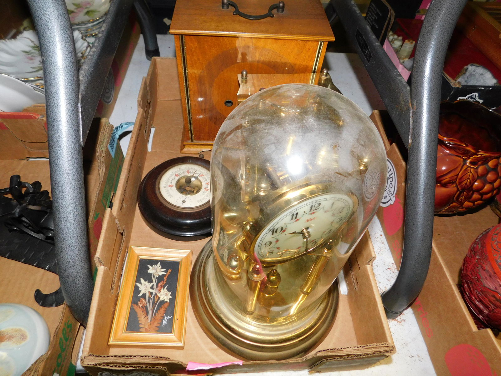 Box Lot of Clocks: Box Lot of Clocks. You are bidding at a live sale. Please read the terms and conditions. This sale will be broadcast live on sale day with full descriptions of each lot being sold, as well as video fe