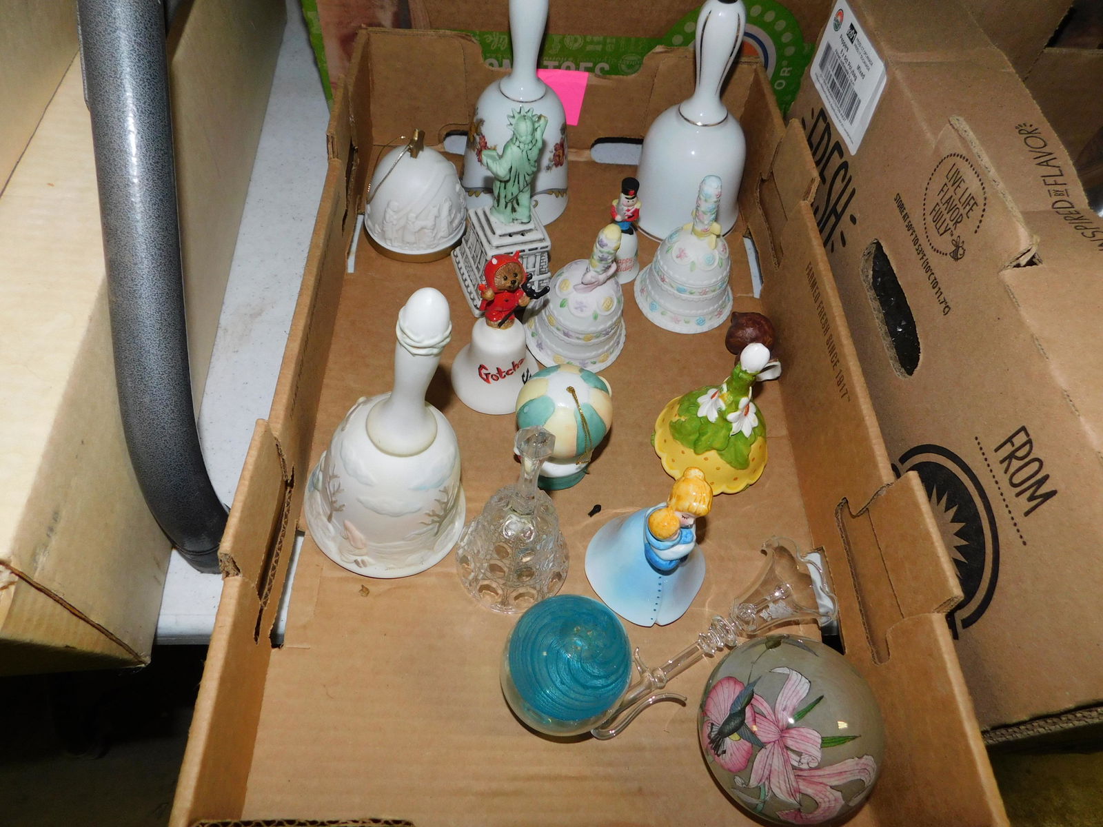 Box Lot of Bells: Box Lot of Bells. You are bidding at a live sale. Please read the terms and conditions. This sale will be broadcast live on sale day with full descriptions of each lot being sold, as well as video fee