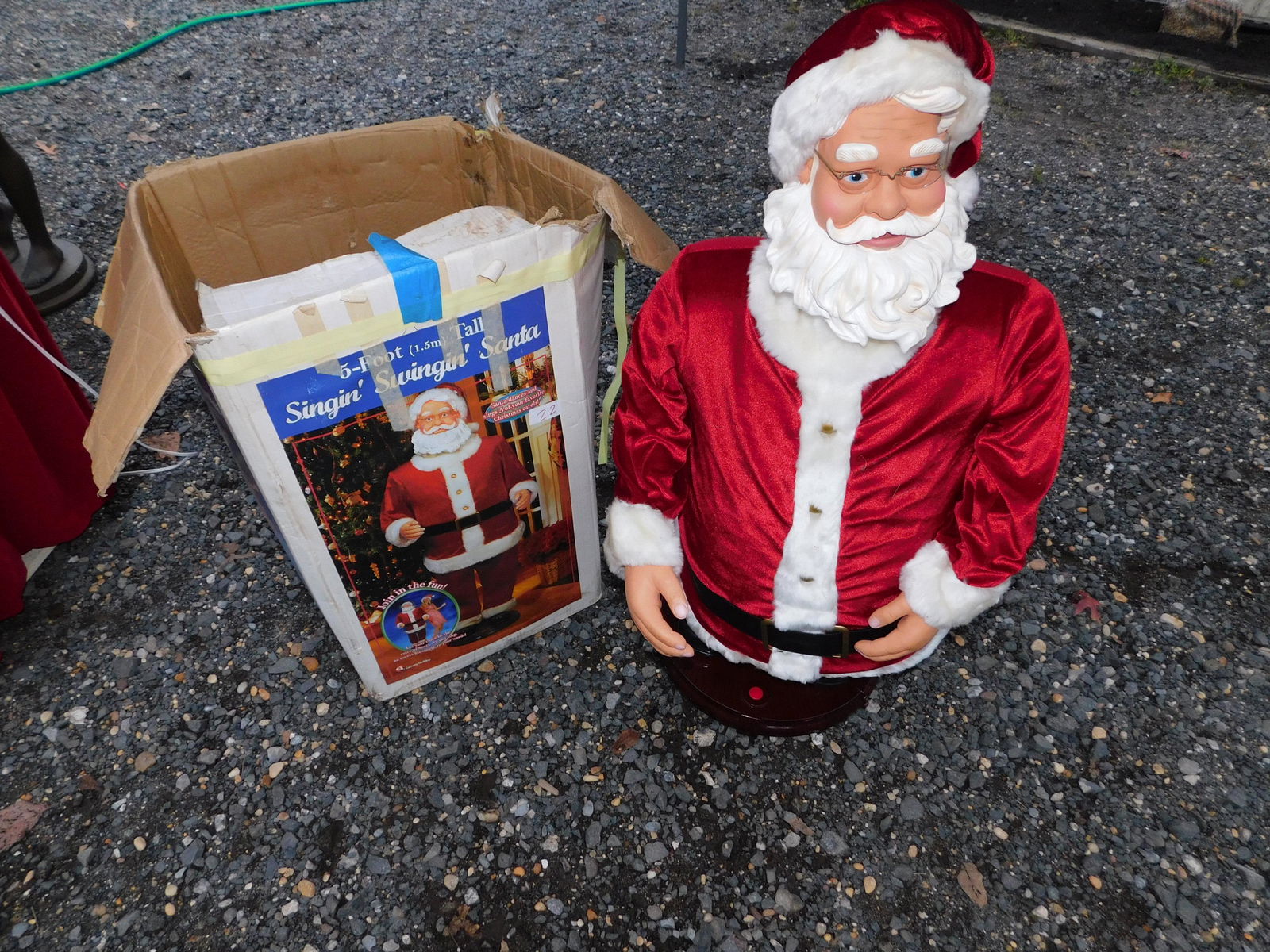 Singing Swinging Santa in Box: 5ft. Singing Swinging Santa in Box. You are bidding at a live sale. Please read the terms and conditions. This sale will be broadcast live on sale day with full descriptions of each lot being sold, as