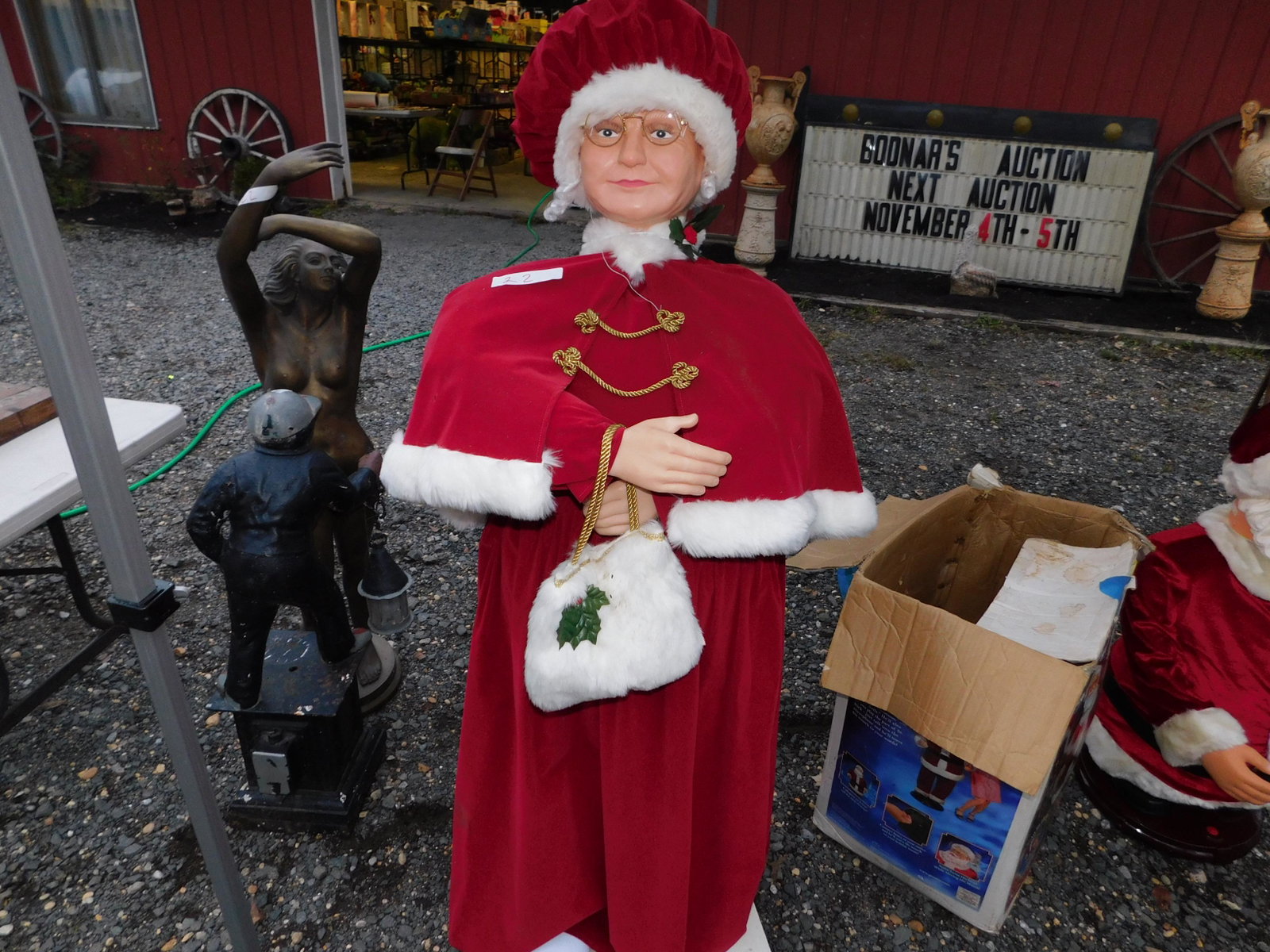 Animated Christmas Caroler: Outdoor Animated Christmas Caroler/Mrs. Claus. You are bidding at a live sale. Please read the terms and conditions. This sale will be broadcast live on sale day with full descriptions of each lot bei